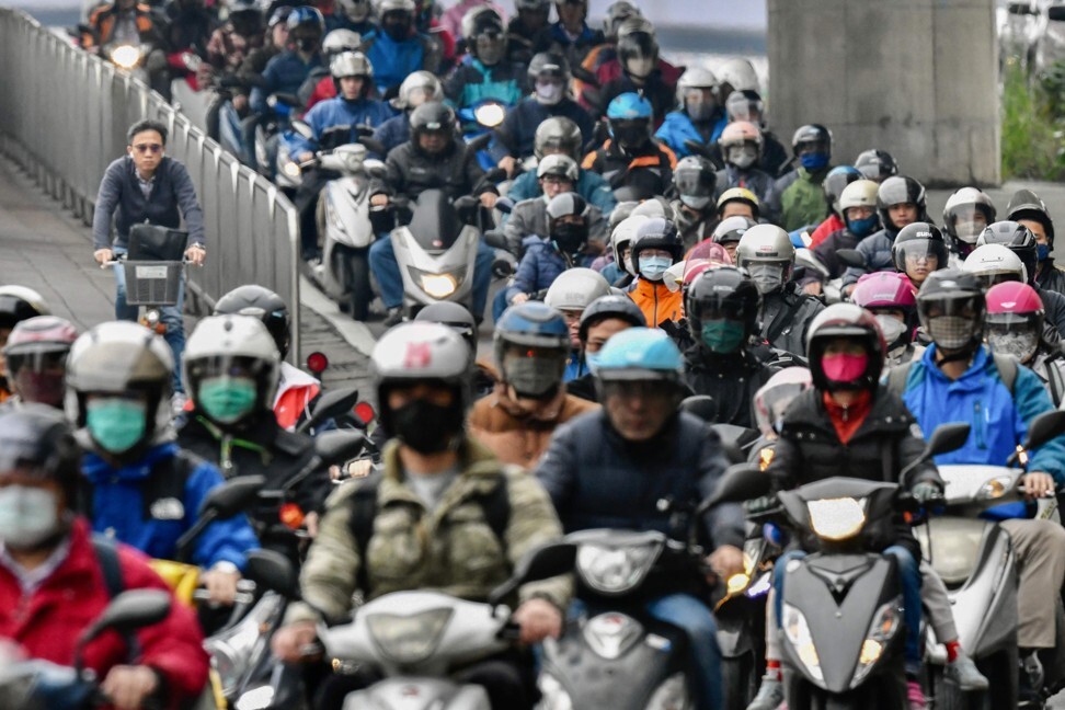 Motorbike riders are seen in Taipei. Photo: AFP