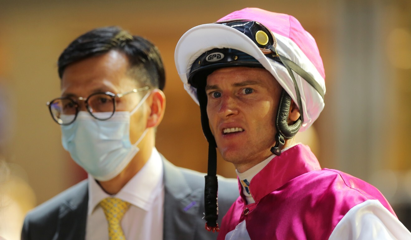 Frankie Lor with Zac Purton after a Happy Valley winner.