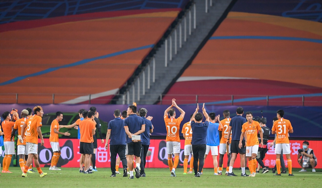 Wuhan Zall players applaud their supporters after a game against Beijing Guoan in the postponed CSL season in Suzhou, Jiangsu province. Photo: Xinhua