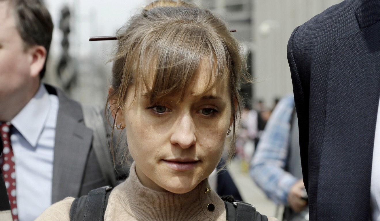 Actress Allison Mack leaves federal court in New York after pleading guilty to racketeering charges in April 2019. Photo: AP