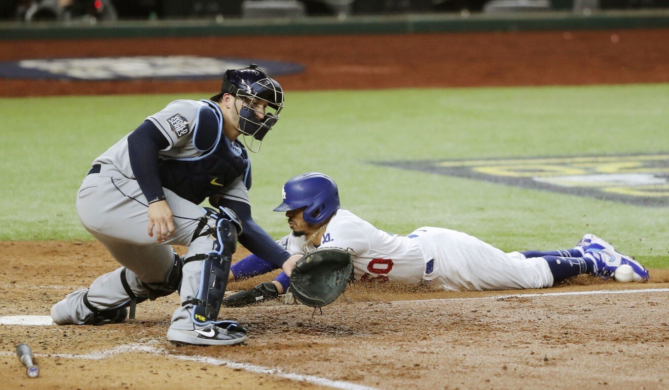 Mookie Betts of the Los Angeles Dodgers scores the go-ahead run in game six against the Tampa Bay Rays in Arlington, Texas. Photo: Kyodo
