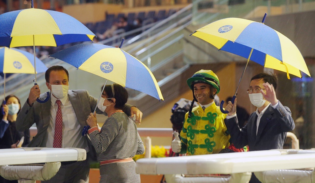 Caspar Fownes and Joao Moreira with the connections of Sky Darci after his win on Wednesday night.