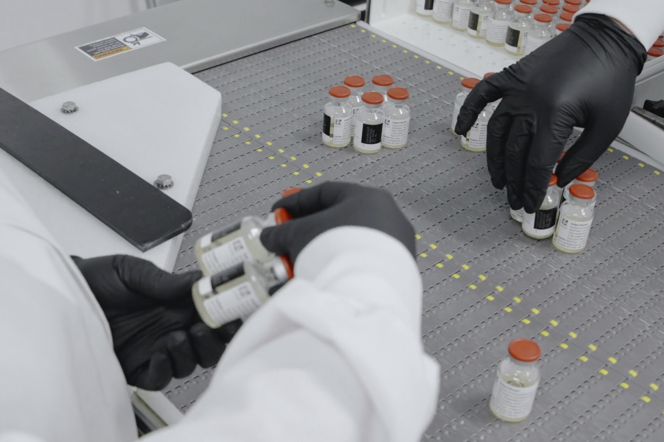 Vials are inspected at Regeneron Pharmaceuticals’ facilities in New York. Photo: Regeneron handout via AP