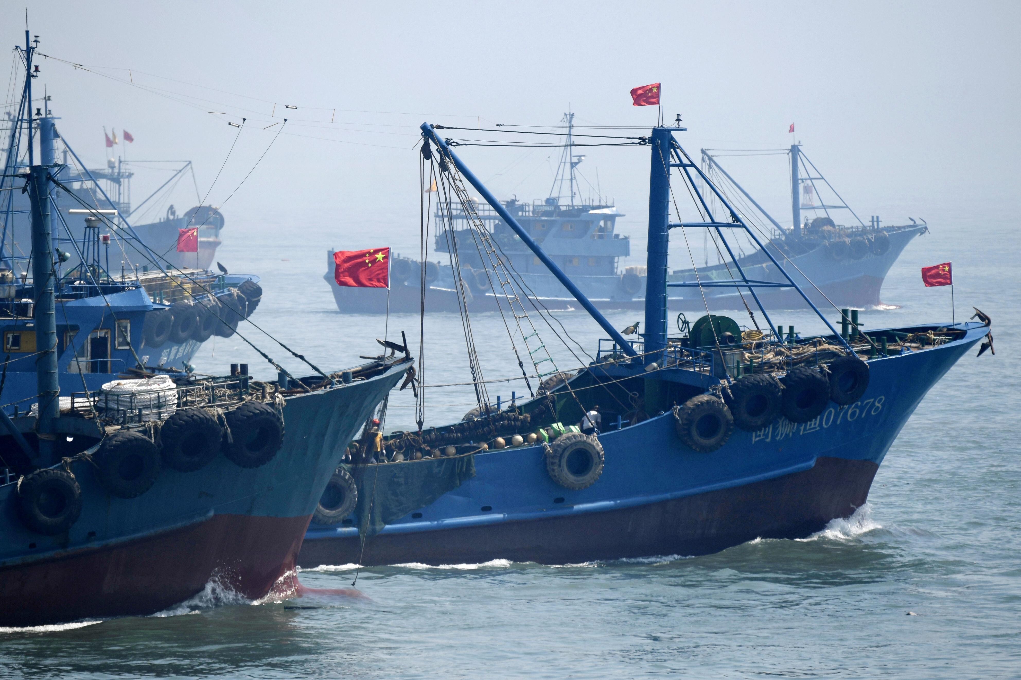 Chinese fishing vessels leaving a port in Shishi, Fujian province. China has the world’s largest industrial fishing fleet. Photo: Kyodo