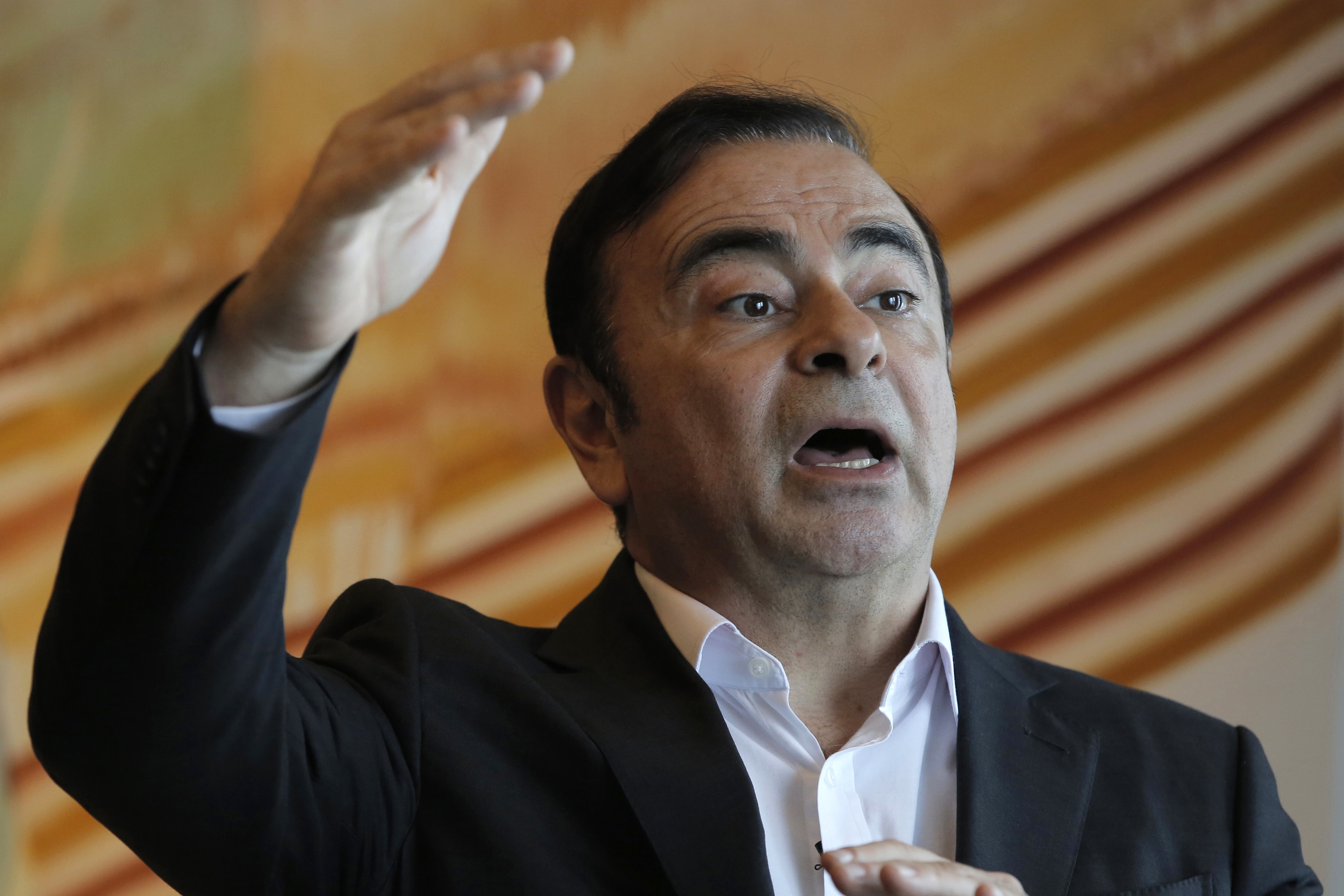 Carlos Ghosn, then the chairman of Nissan, speaks during an interview in Hong Kong in 2018. Photo: AP