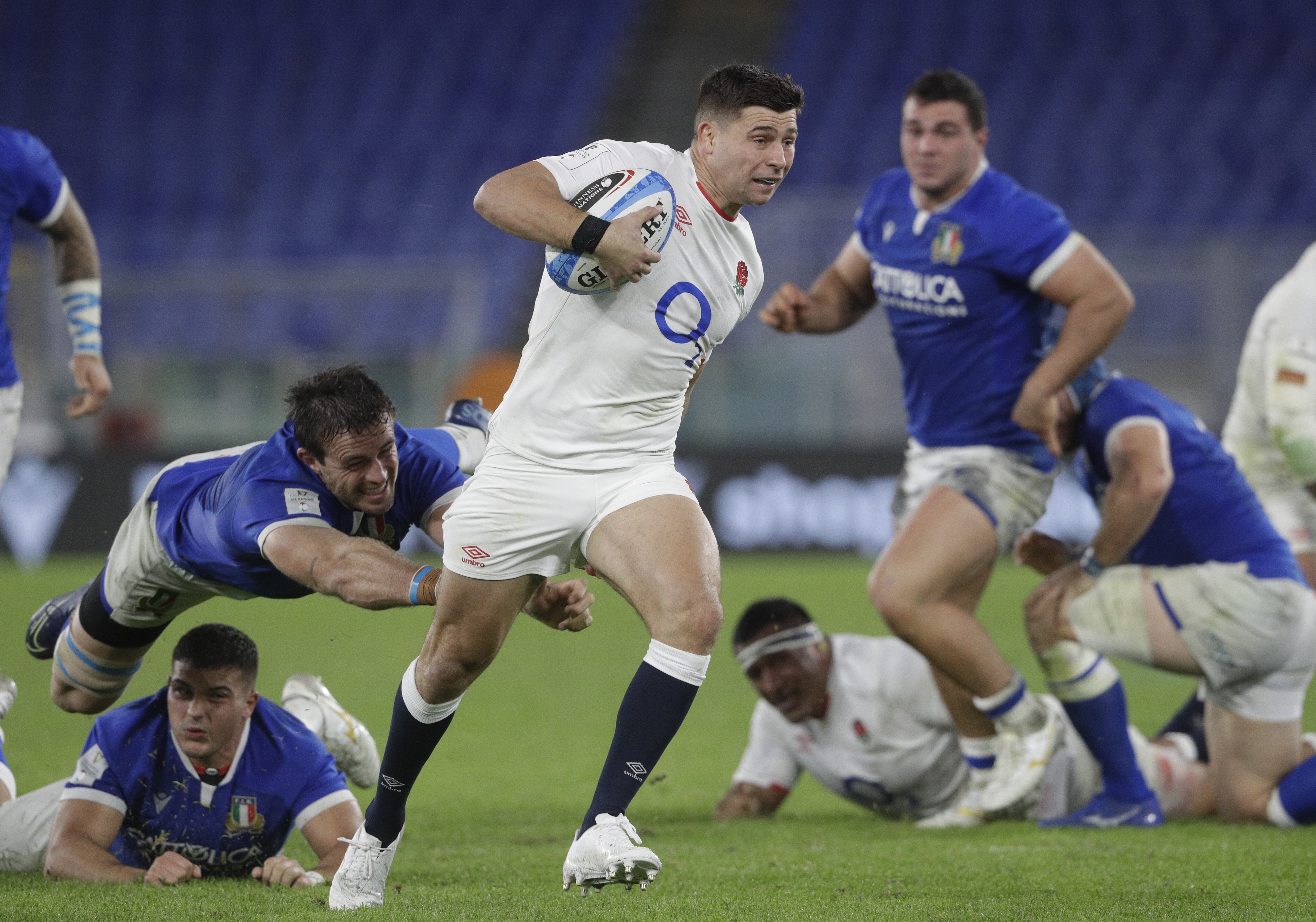 England’s Ben Youngs breaks free of the Italian defence as England claim the delayed Six Nations title. Photo: AP