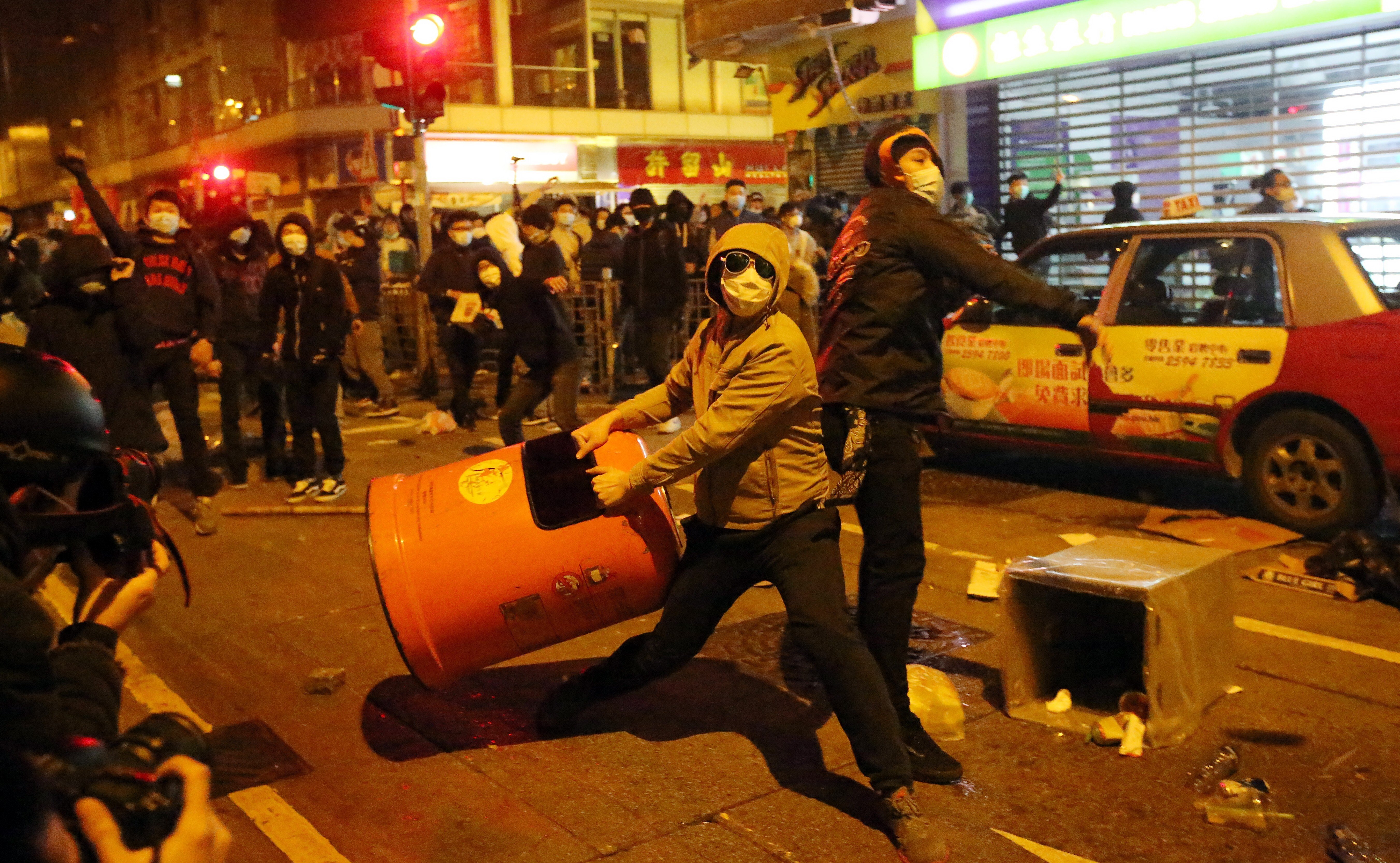 Masked protesters clash with police in Mong Kok during the three-day Lunar New Year holiday in 2016. Photo: Edward Wong
