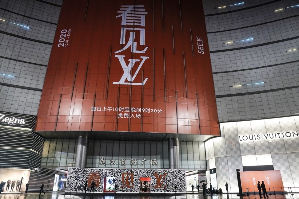 FILE--View of a shopwindow of Louis Vuitton (LV) in Wuhan city, central  China's Hubei province, 18 March 2019. LVMH shares hit a record high on  Thursday and buoyed those of rivals after
