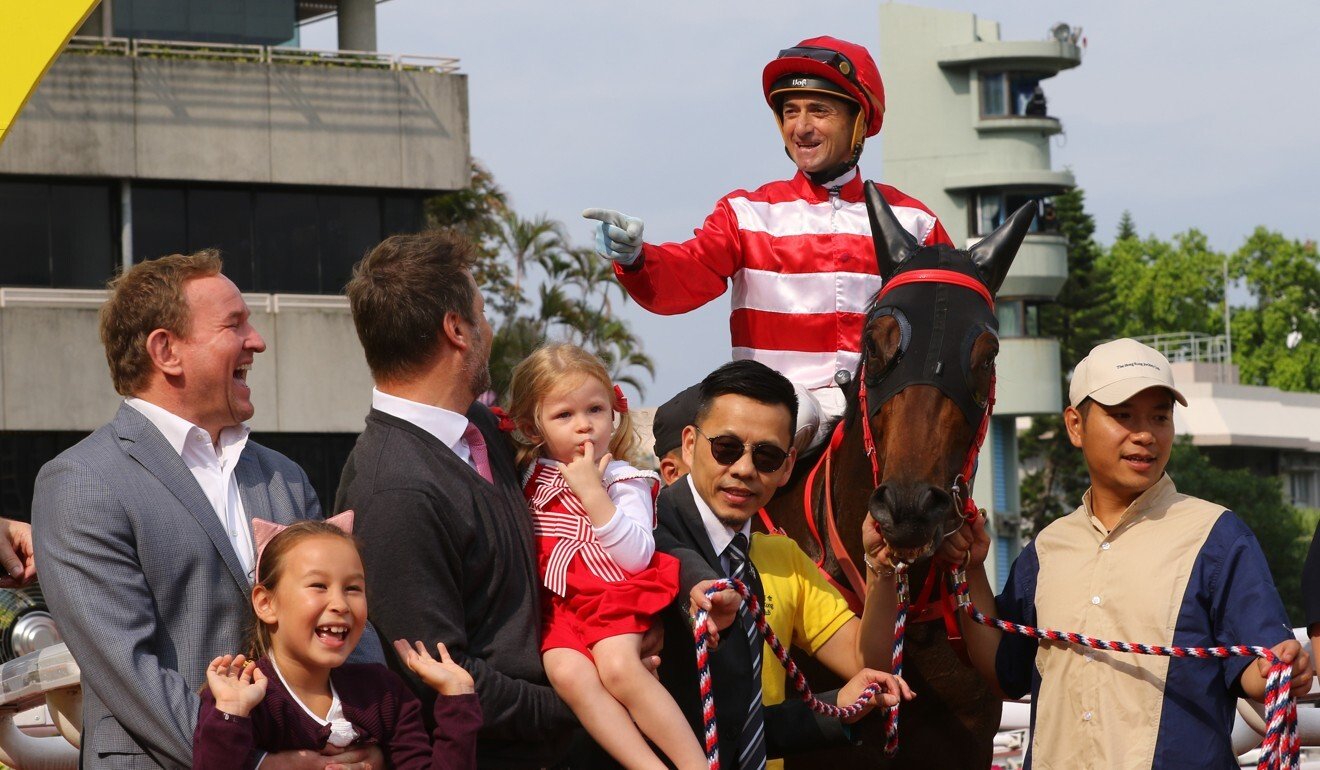 Melvyn Ford (second from left) with connections of Wayfoong Vinnie after a win at Sha Tin.