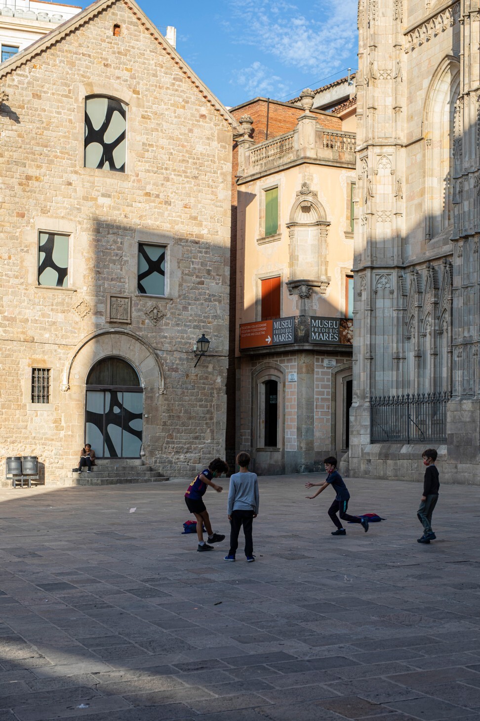 Football outside the Gothic cathedral. Photo: Matilde Gattoni
