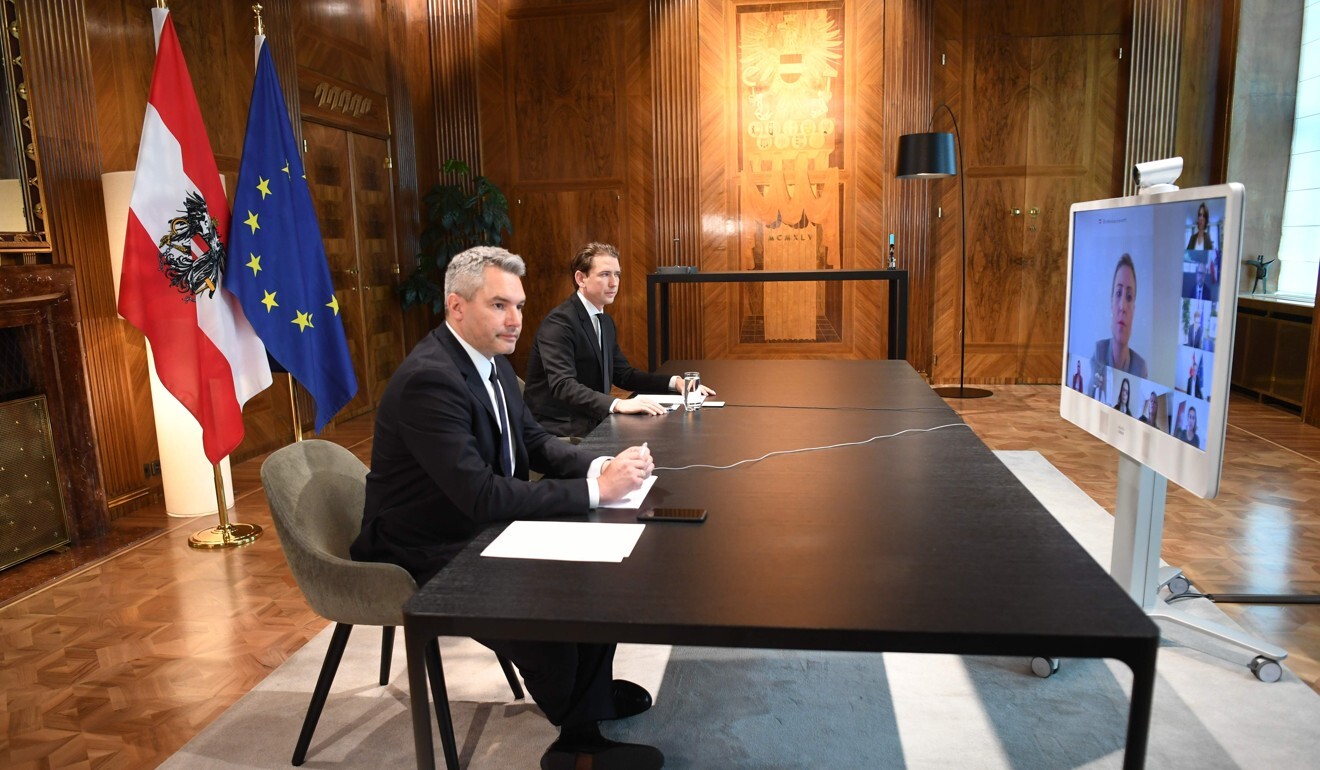 Austrian Interior Minister Karl Nehammer (L) and Austria's Chancellor Sebastian Kurz hold a video conference on November 3 after multiple shootings in Vienna. Photo: AFP