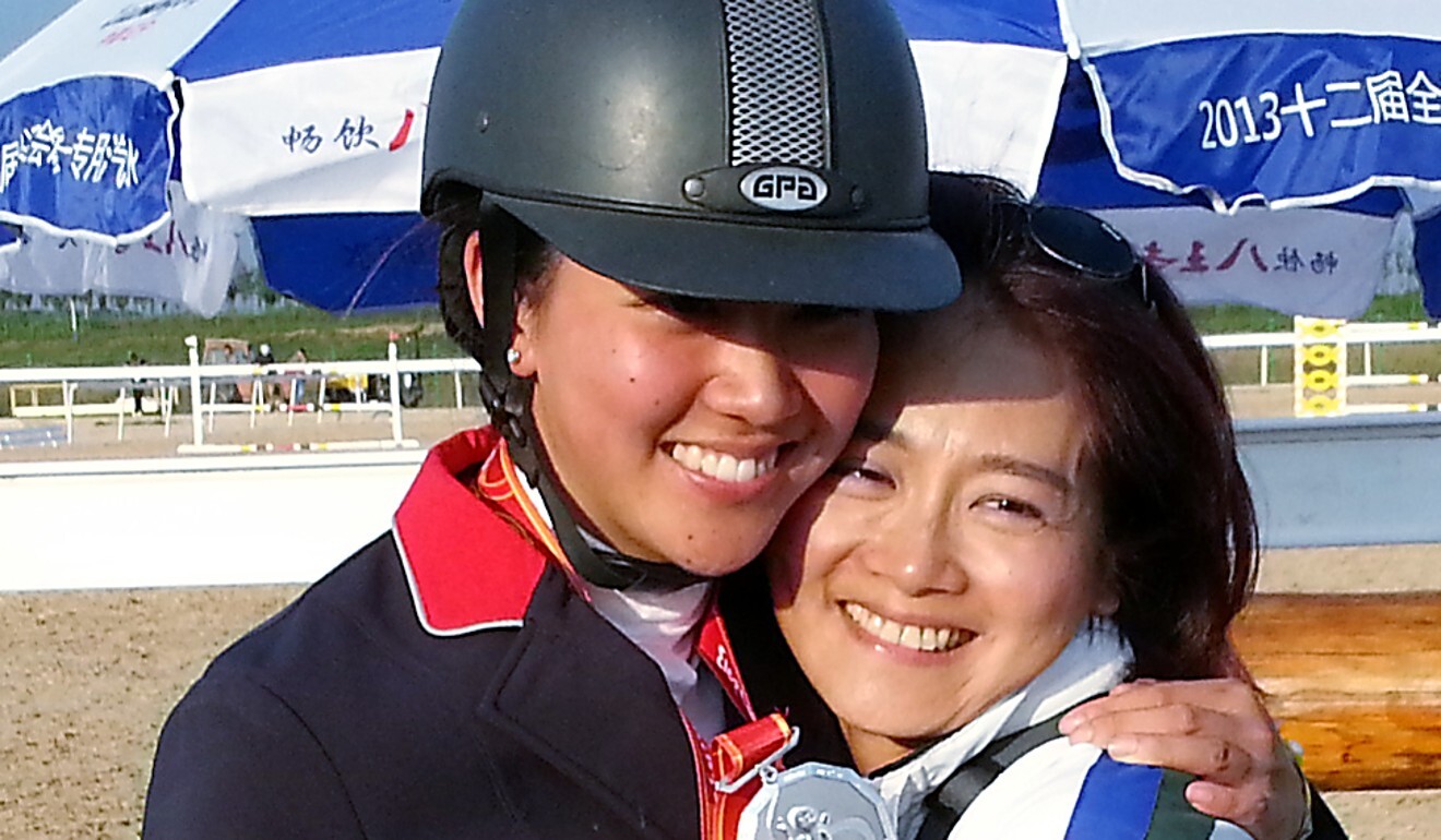 Jacqueline Lai and her mother Ng Ha-ping celebrate the silver medal at the 2013 China National Games. Photo: Handout