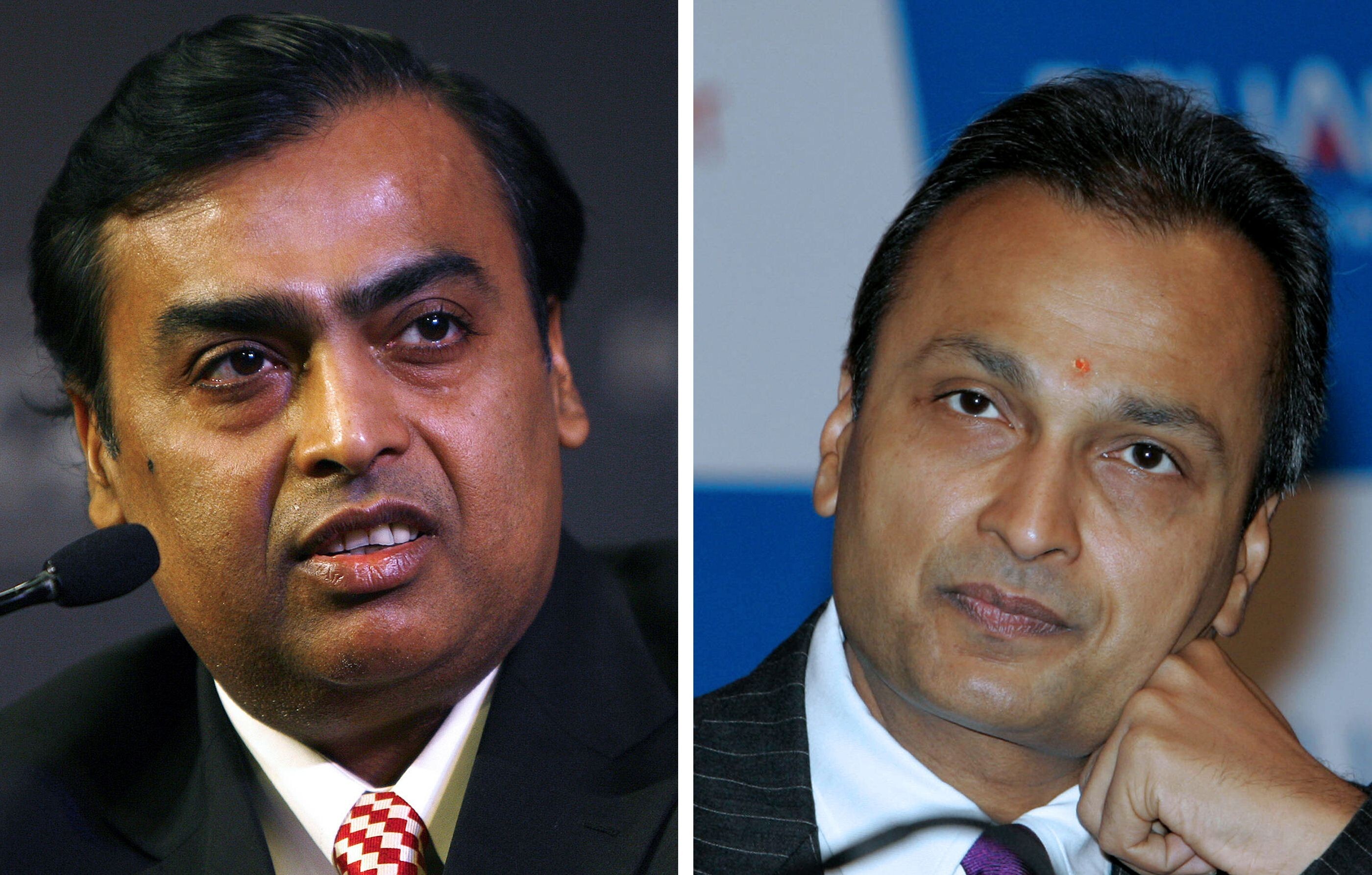 Mukesh Ambani (L) and his brother Anil Ambani (R) haven’t always seen eye to eye since their father died. He left no will, pitting them against each other for control of the family business. Photo: AFP