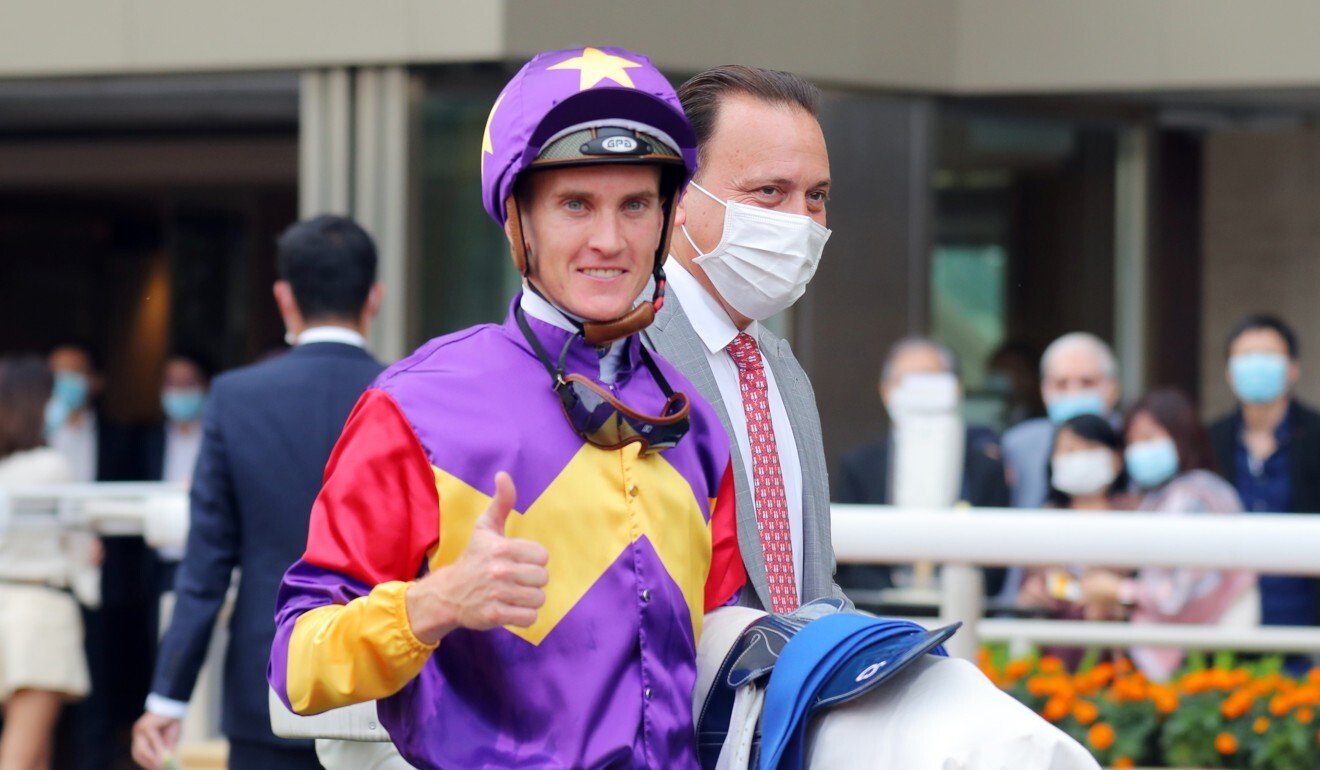 Jockey Chad Schofield with Caspar Fownes after Lucky Quality’s win at Happy Valley.