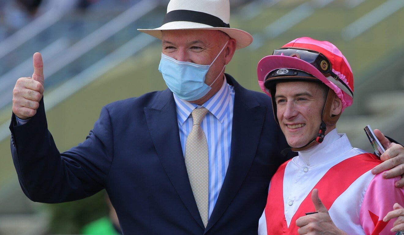 Trainer David Hayes and jockey Blake Shinn celebrate after teaming up to salute with Fearless Fire.