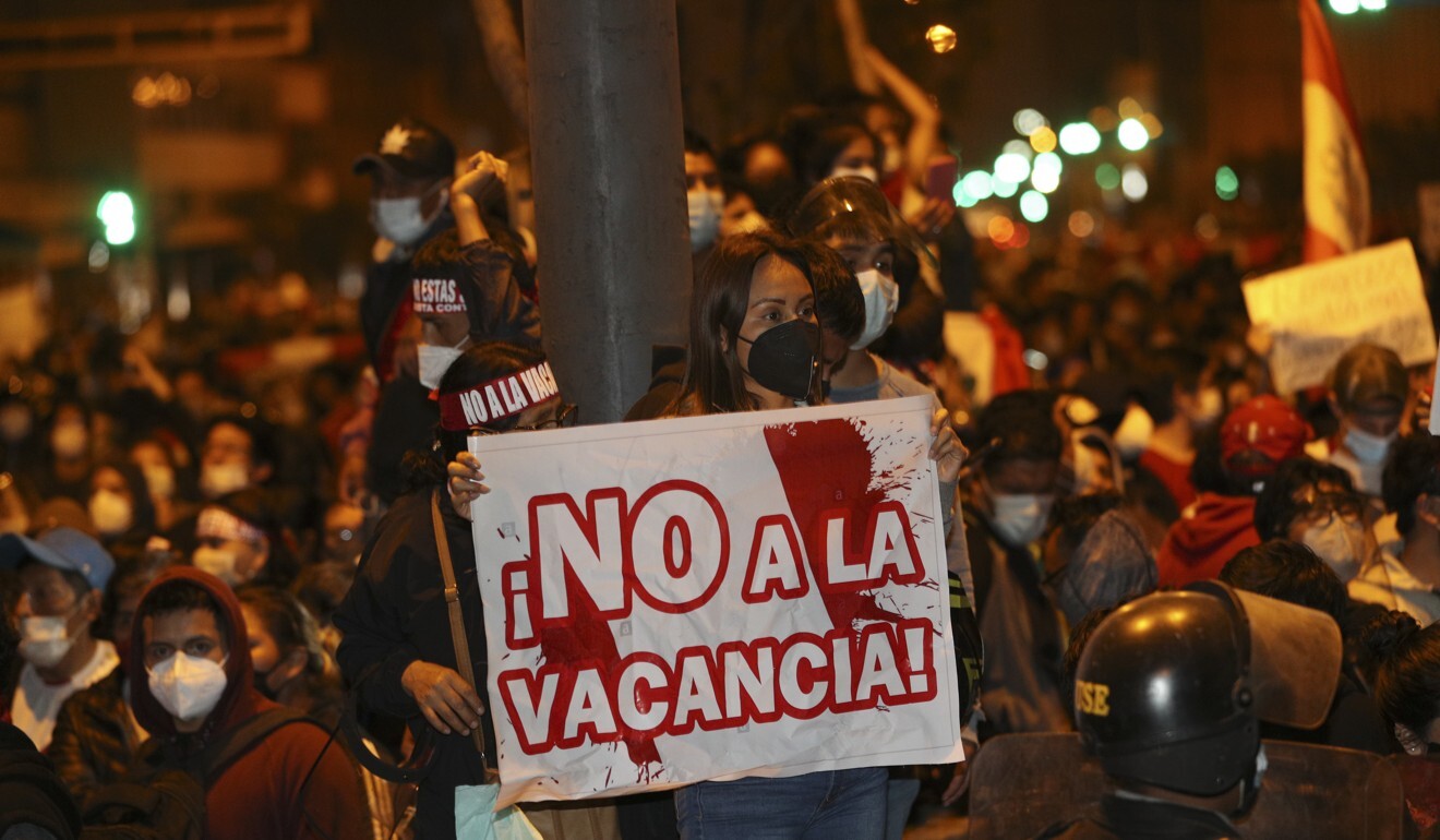 Supporters of Martin Vizcarra protest his removal. Photo: AP