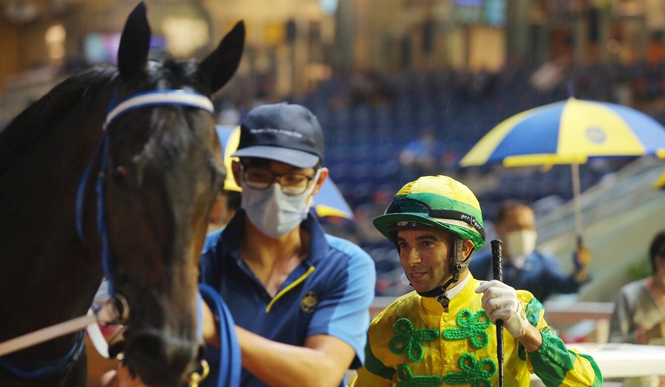 Joao Moreira with Sky Darci after winning at Happy Valley.