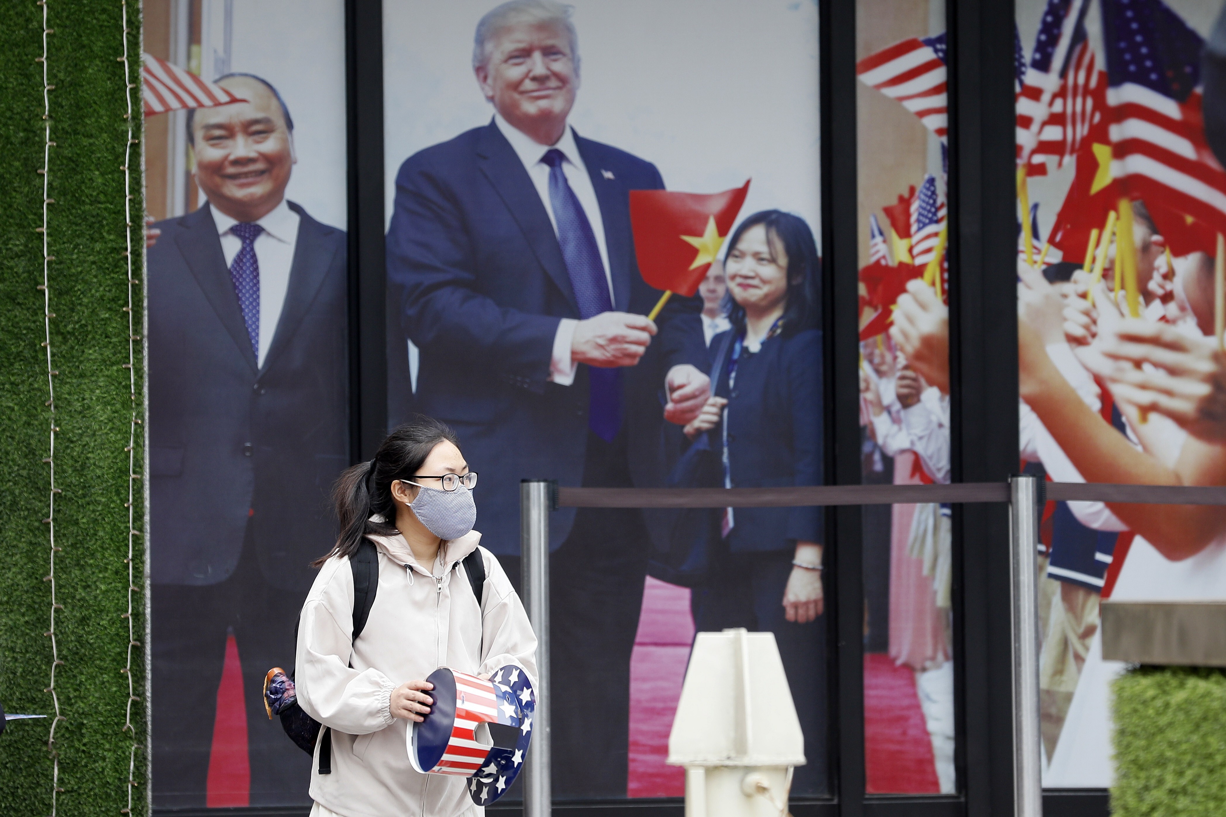 A photo display of Vietnamese Prime Minister Nguyen Xuan Phuc and US President Donald Trump outside a Hanoi hotel. The US-Vietnam relationship could take a turn for the better under a Joe Biden presidency, at least in terms of trade. Photo: EPA-EFE