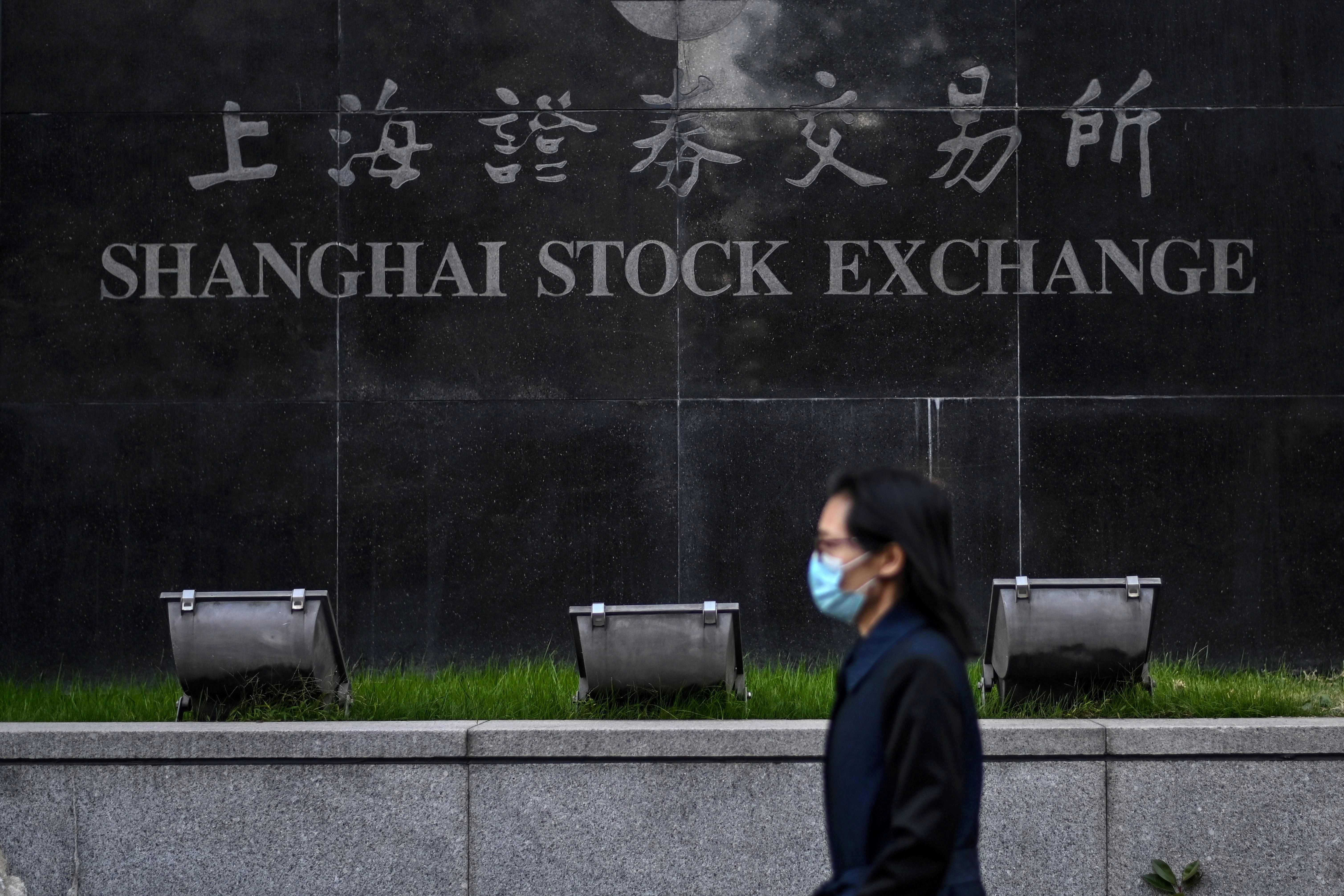 Investors in China lacks rationality for paying a large premium for shares on local bourses of companies with cross listings in Hong Kong. Photo: Agence France-Presse
