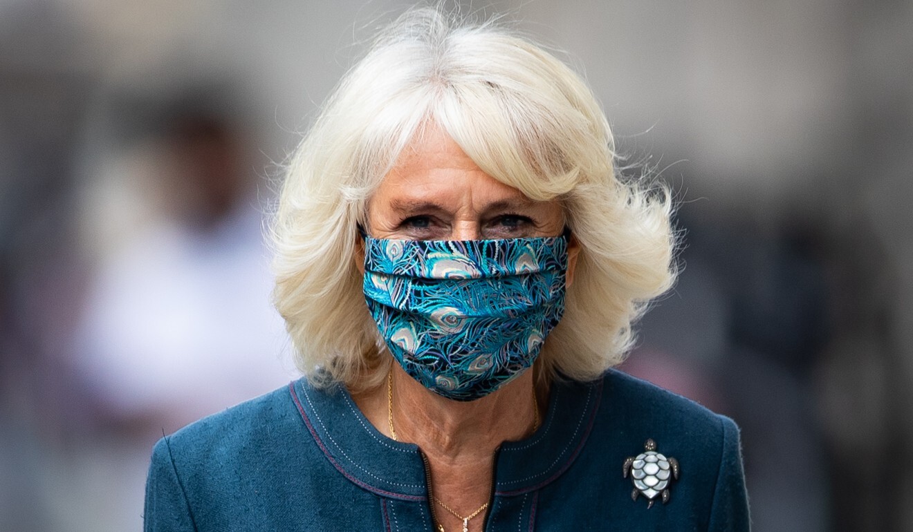 The Duchess of Cornwall has worn some striking peacock and leopard patterned masks. Photo: Aaron Chown/DPA