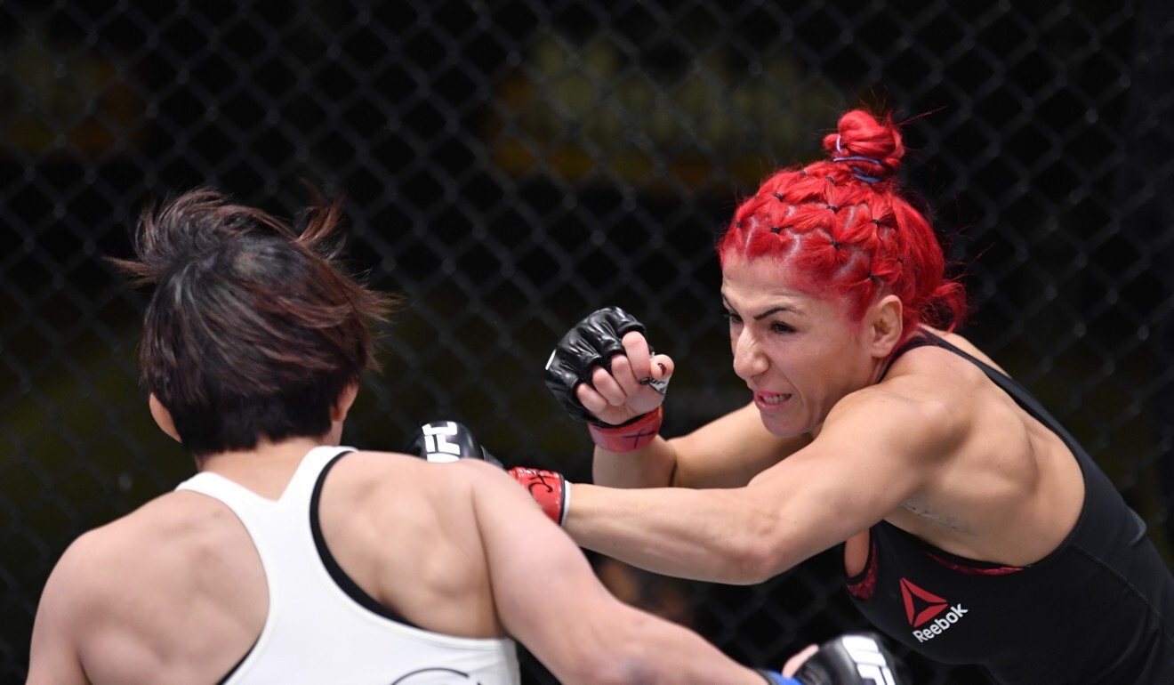 Randa Markos tries to punch Kanako Murata during their strawweight fight in Las Vegas.