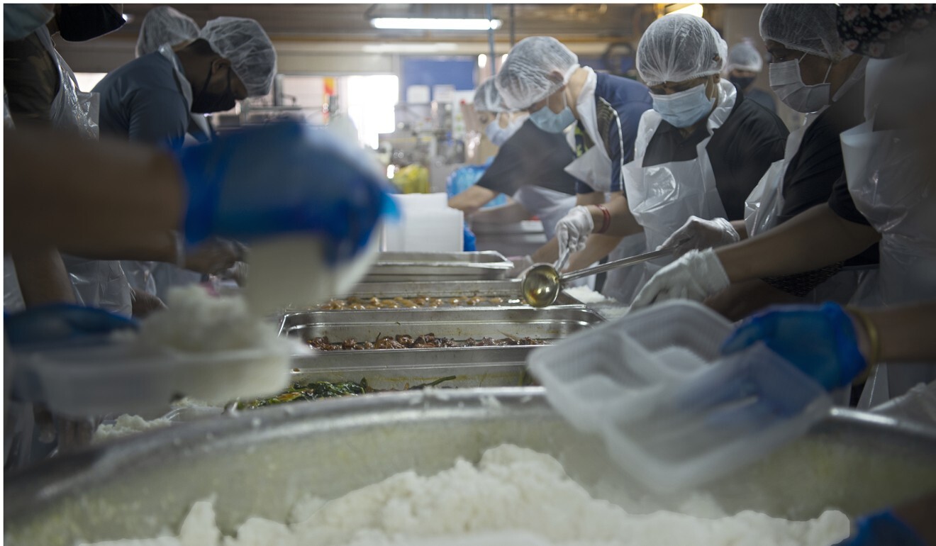 Caterers in Singapore begin preparing meals many hours in advance to deliver lunch by dawn. Photo: Alvin Lim