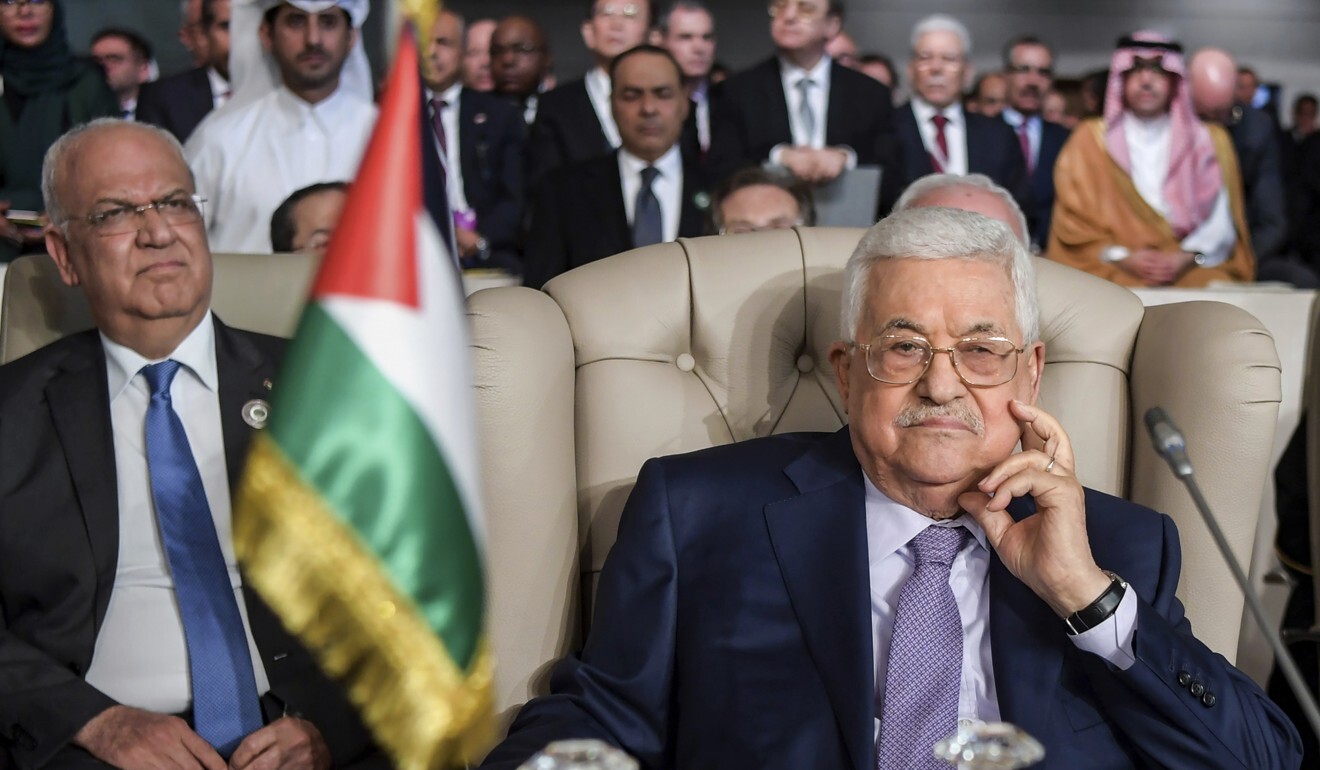 Palestinian President Mahmoud Abbas, right, and Secretary General of the Palestinian Liberation Organisation Saeb Erekati. Photo: AP