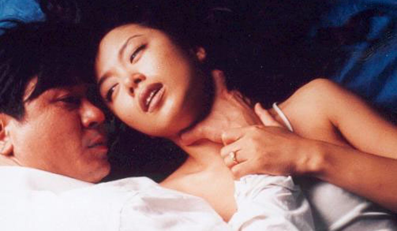 Choi Min-sik (left) and Jeon Do-yeon in a still from Happy End (1999).