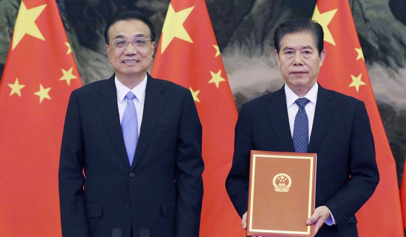 Chinese Premier Li Keqiang (left) attends the signing ceremony of the RCEP agreement at the Great Hall of the People in Beijing. Photo: Xinhua