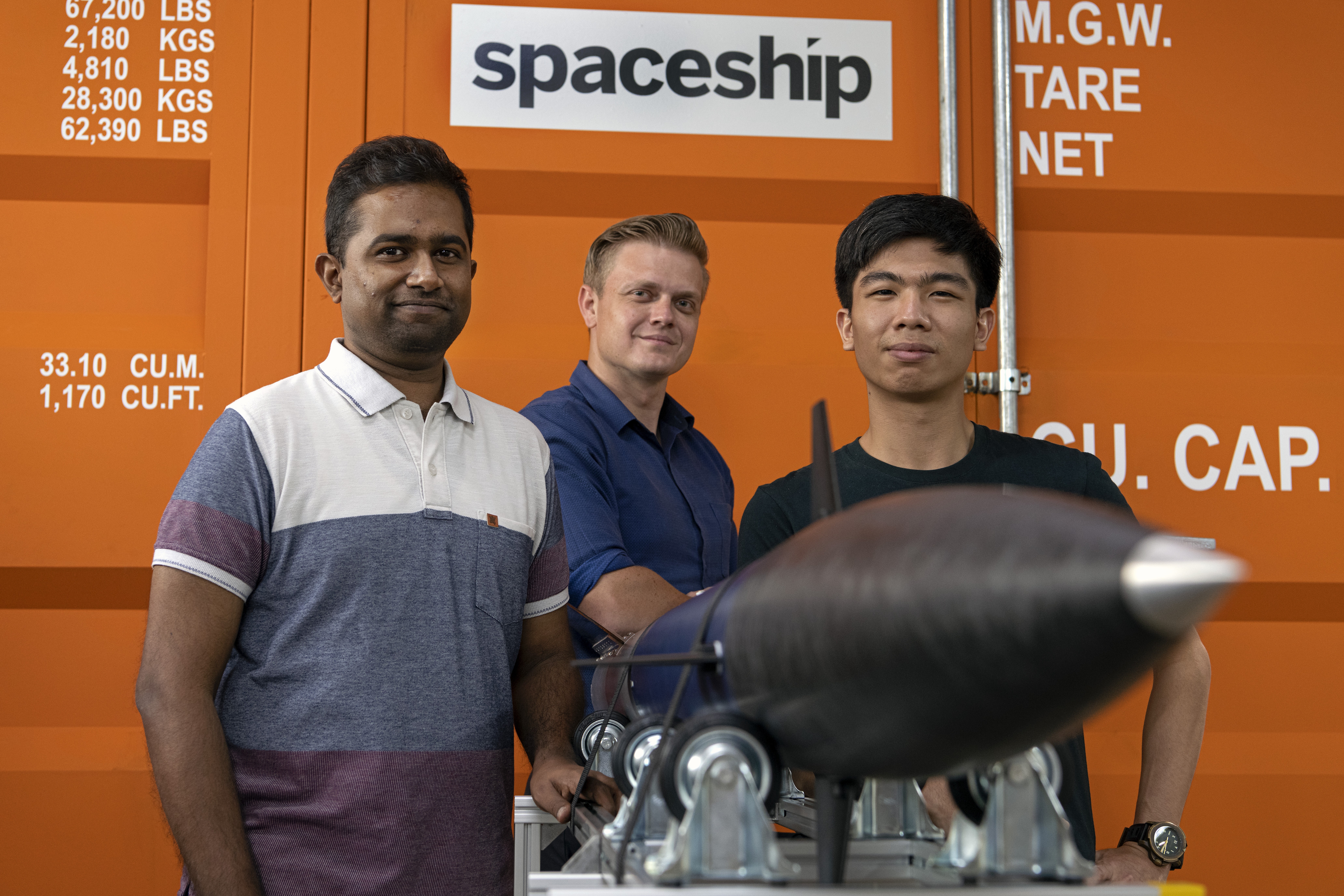 From left: Praveen Ganapathi Perumal, Simon Gwozdz and Nah Yi Jie of Equatorial Space Systems with their low- altitude demonstration rocket. Photo: Scott A. Woodward