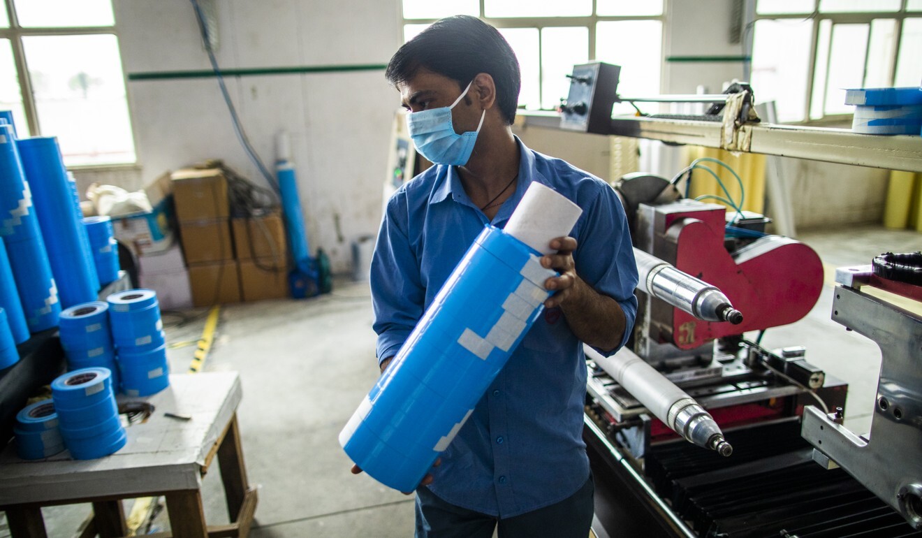 A worker pictured in a factory in India’s Haryana state in April amid the coronavirus pandemic. Photo: Bloomberg