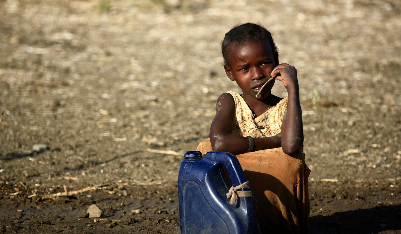 An Ethiopian girl who fled fighting in the Tigray region sits at the Village 8 border reception centre in Sudan’s eastern Gedaref state. Photo: AFP