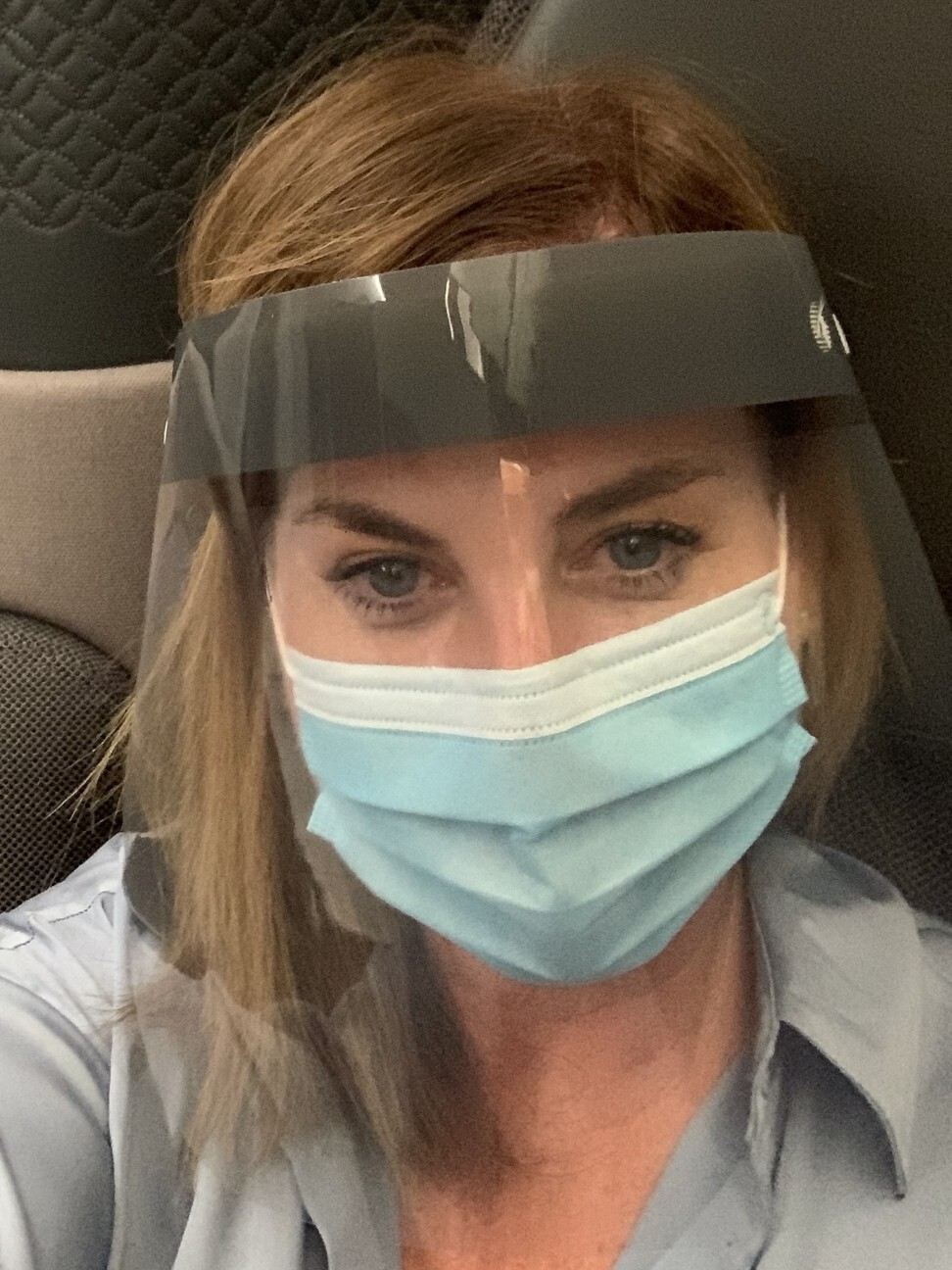SCMP writer Lee Cobaj wears a visor and face mask as she flies to the Maldives with Qatar Airways. Photo: Lee Cobaj