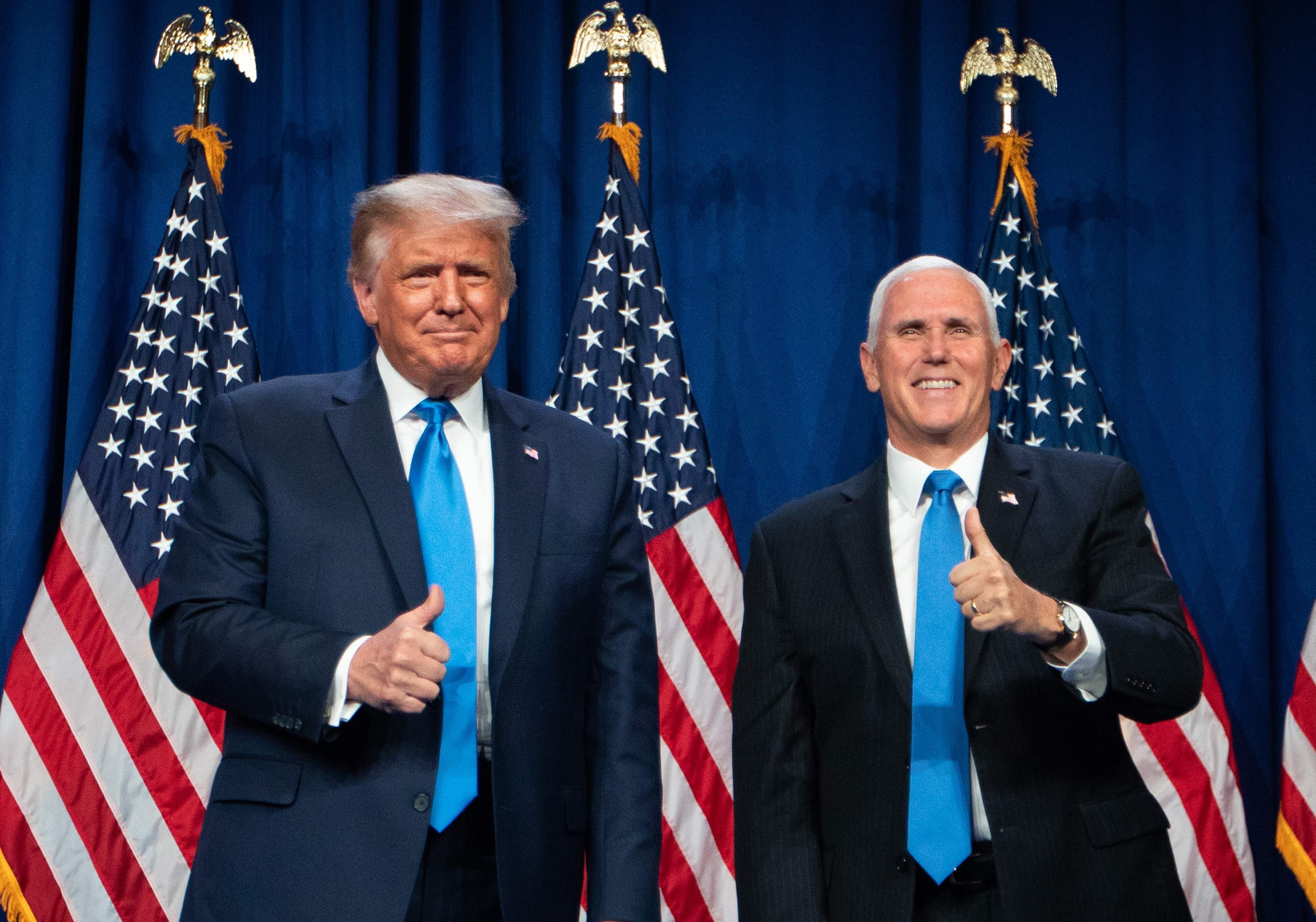 US President Donald Trump and Vice-President Mike Pence. Despite losing the election, Trump is frantically replacing professionals with loyal yes-men. Photo: AFP