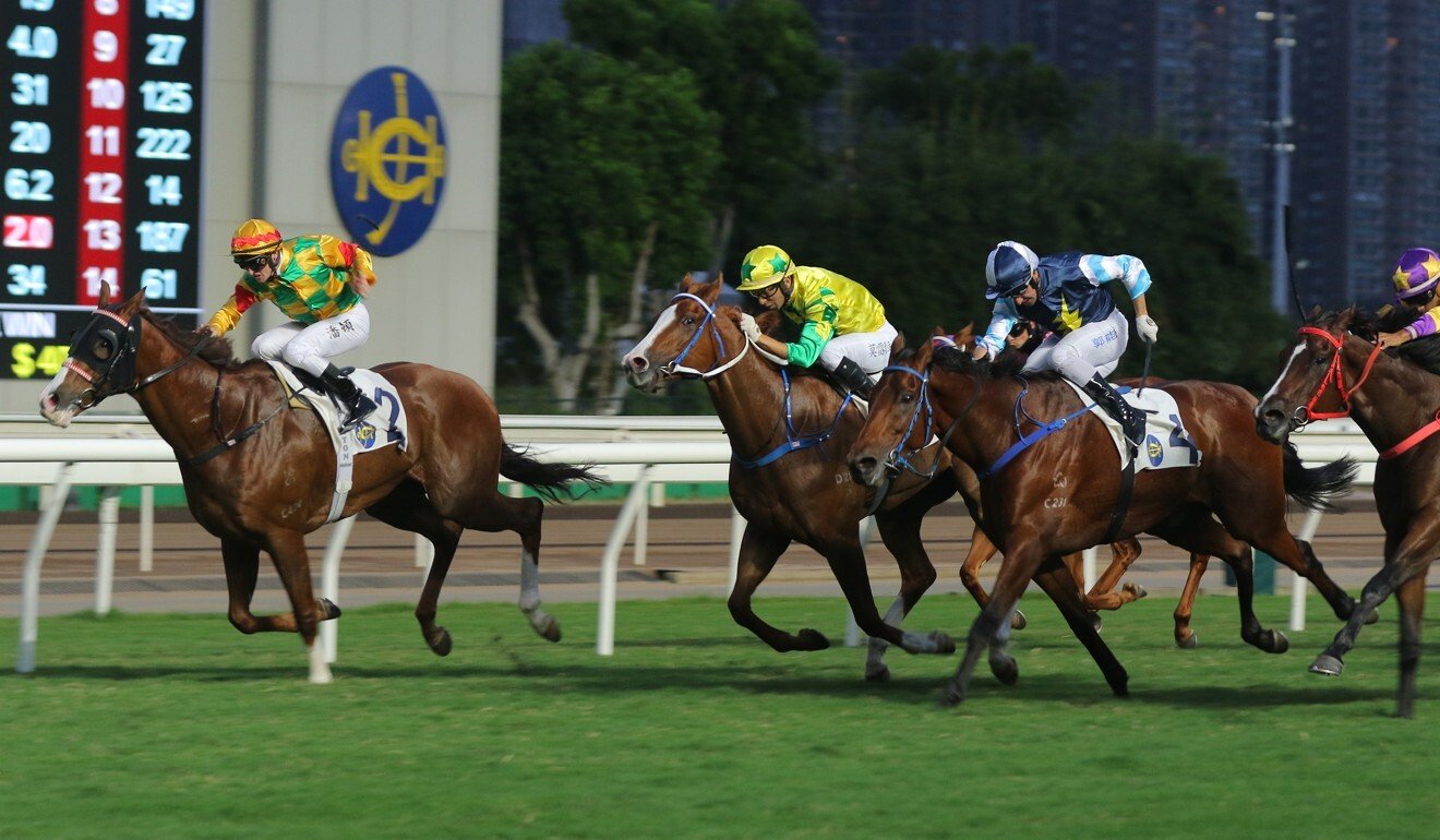 Mighty Giant (inside) wins in Class Two at Sha Tin this season.