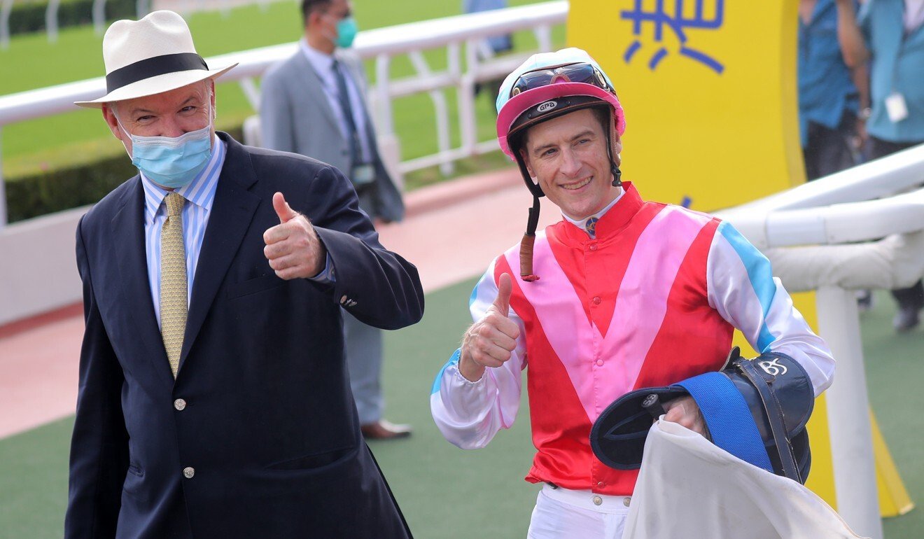 Trainer David Hayes and jockey Blake Shinn celebrate Harmony N Blessed’s win.