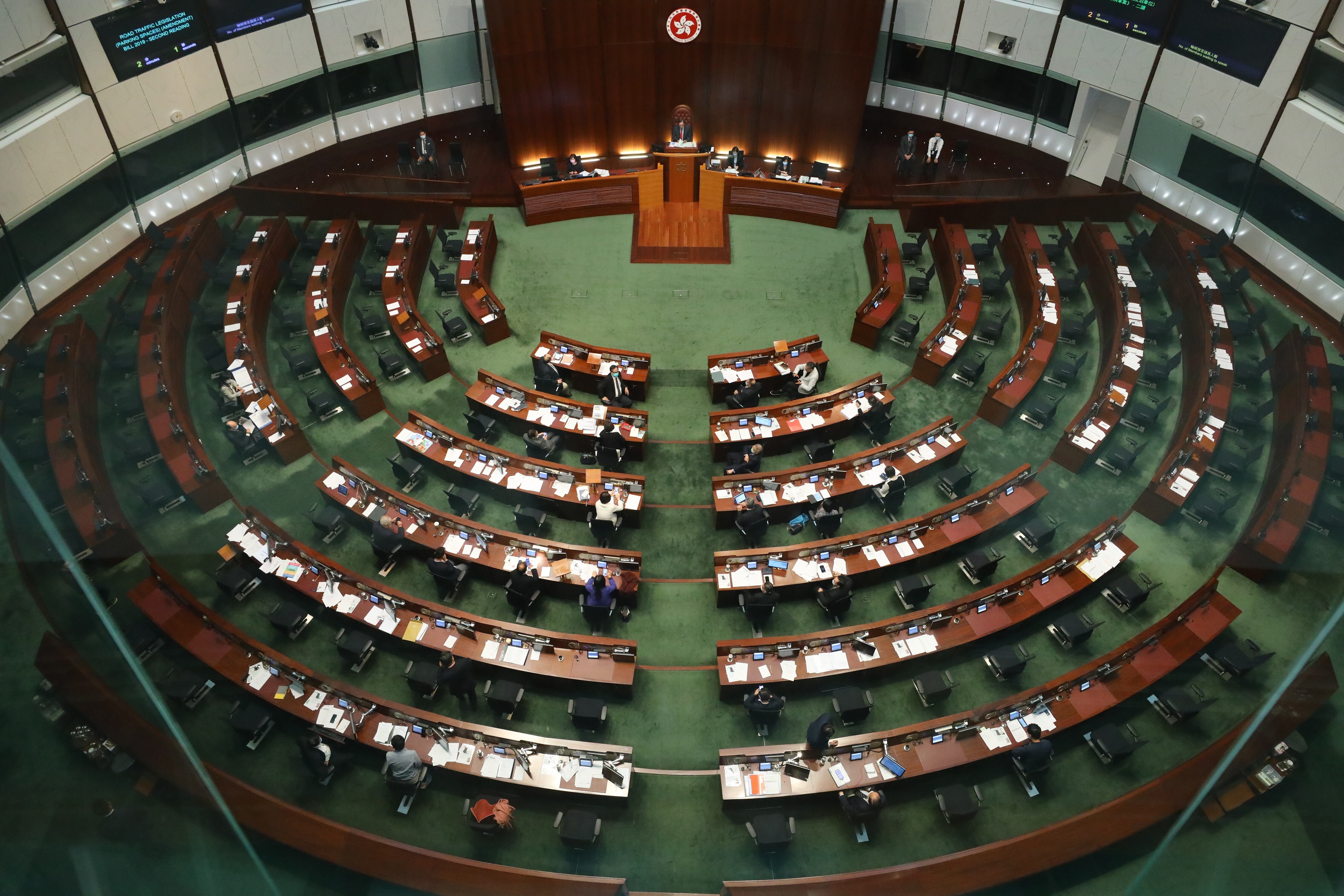 Seats lie empty on the opposition side of the Legislative Council the day after Beijing’s ruling on lawmaker conduct. Photo: Dickson Lee
