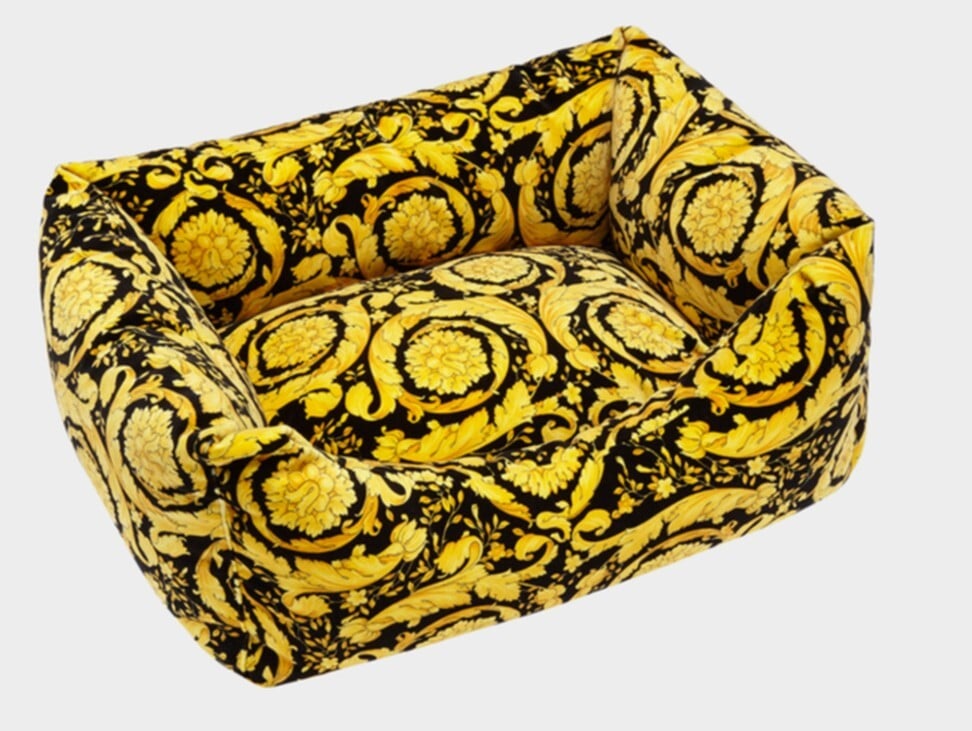 Black and gold Barocco print bed. Photo: Versace