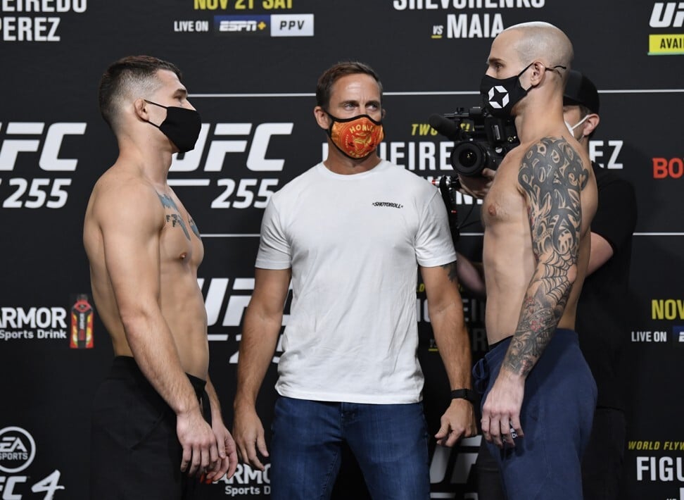 Opponents Louis Cosce and Sasha Palatnikov face off during the UFC 255 weigh-in. Photo: Jeff Bottari/Zuffa LLC