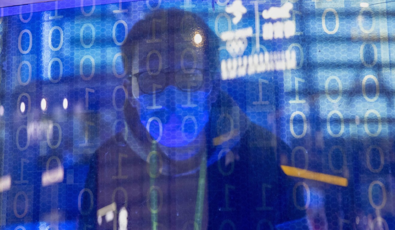 A man looks through the curtain at an installation at the World Internet Conference on 23 November 2020. Photo: EPA-EFE