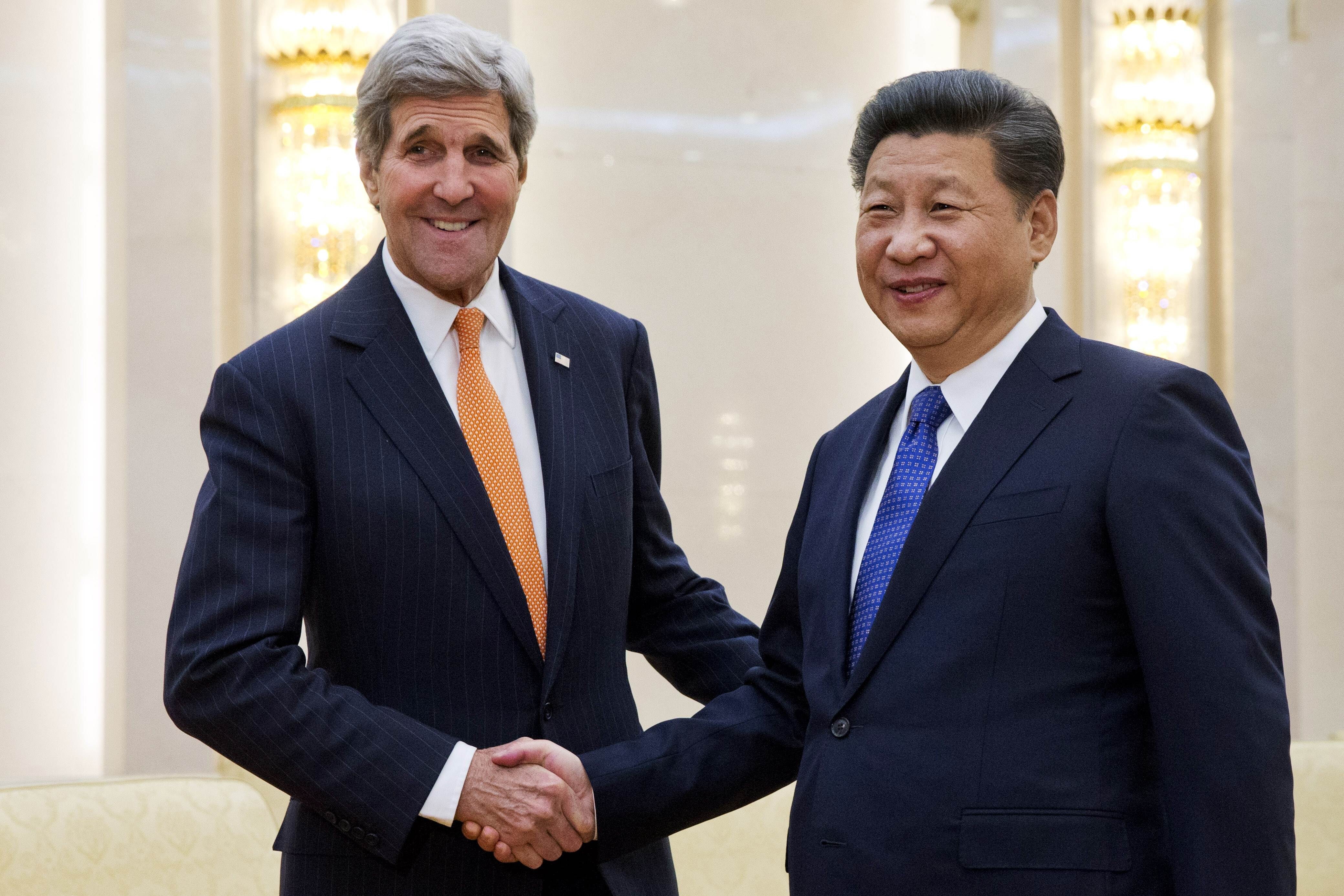 John Kerry, then serving as US secretary of state, meets Chinese President Xi Jinping in Beijing in 2016. Photo: AFP