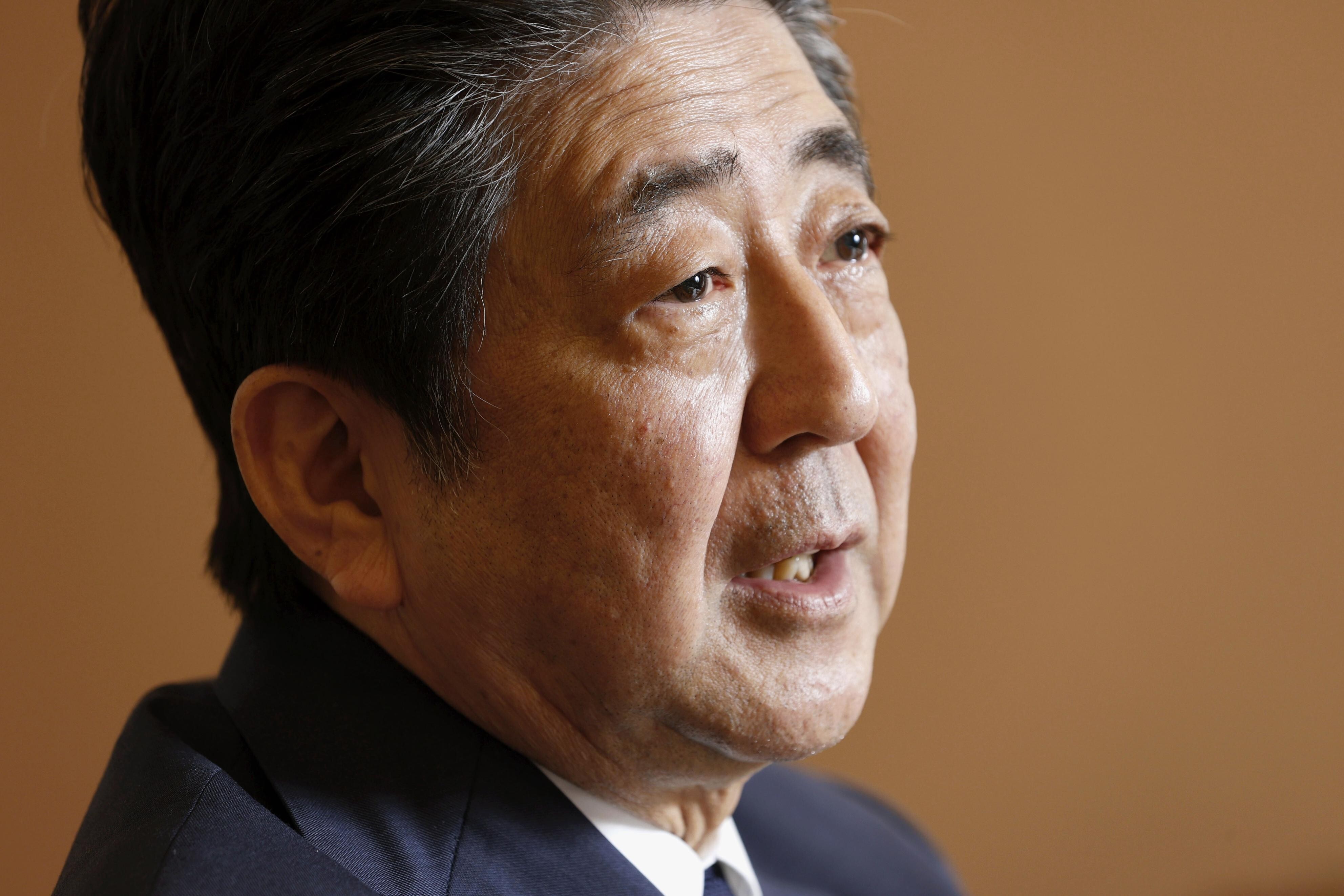 Former Japanese Prime Minister Shinzo Abe speaks during an interview in Tokyo earlier this month. Photo: Kyodo