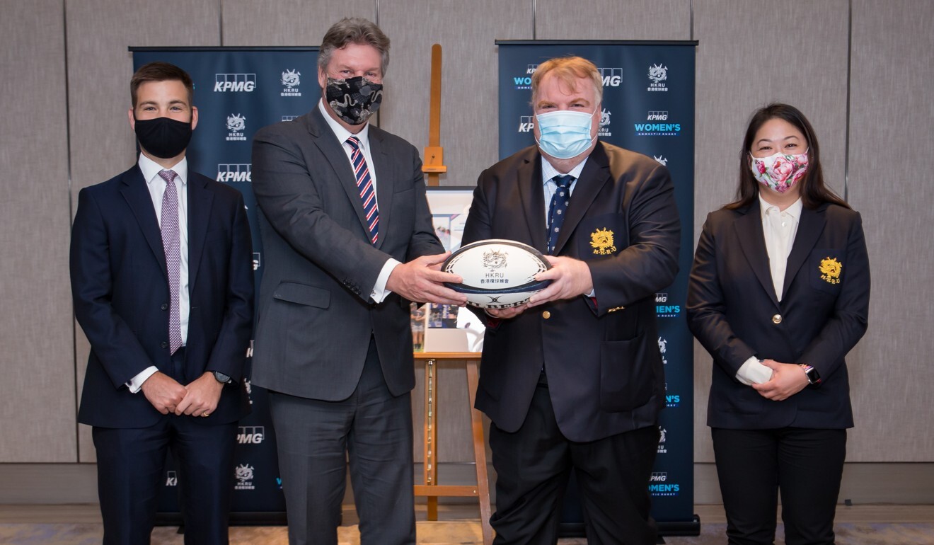 HKRU chairman Patrick Donovan (second right) and director of women's rugby Kim Kan (right) with KPMG China head of advisory Grant Jamieson and survey adviser Luke Templer. Photo: HKRU