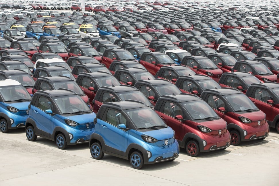 Hundreds of Baojun E100 electric vehicles in the parking lot of the SAIC-GM-Wuling Automobile plan in Liuzhou city of Guangxi province on May 23, 2018. Photo: Bloomberg
