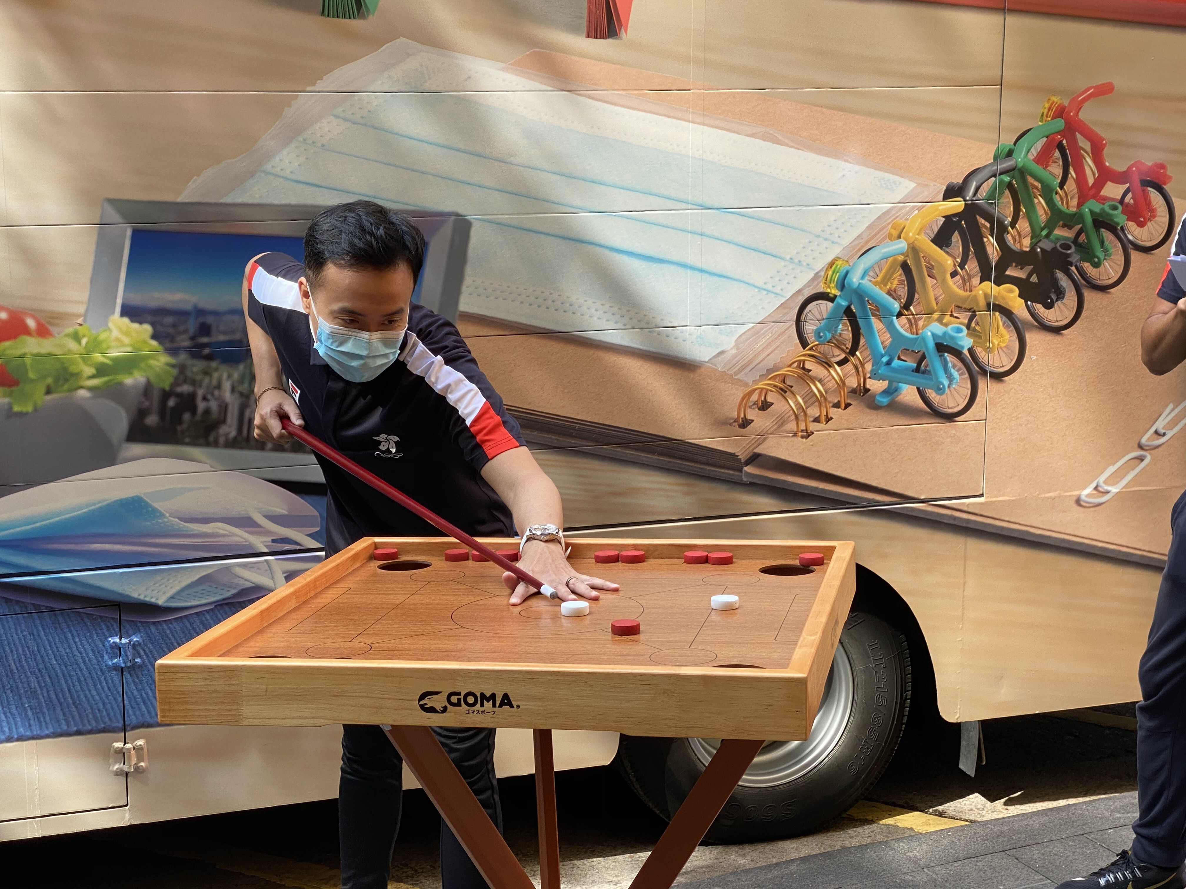Marco Fu employs his snooker skills to play Chinese carom during a promotional event for the 2020 Hong Kong Festival of Sport. Photo: Chan Kin-wa