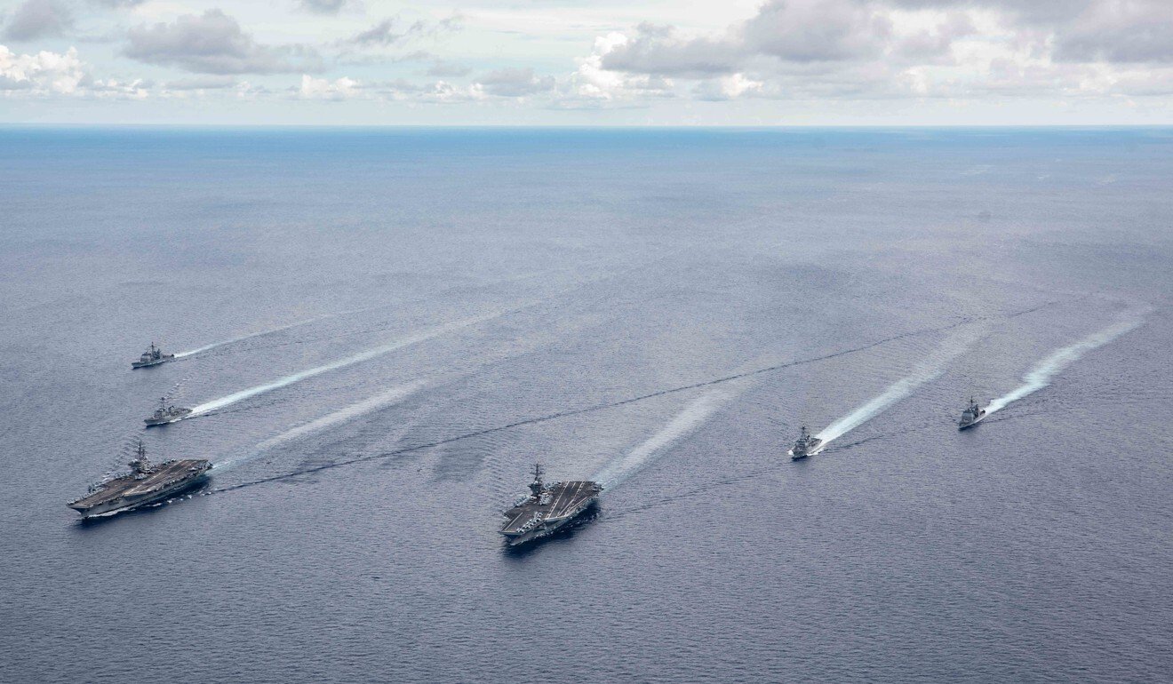 Aircraft carriers USS Ronald Reagan and USS Nimitz and their carrier strike groups in formation during a drill in the South China Sea in July. Photo: US Navy Office of Information via EPA-EFE