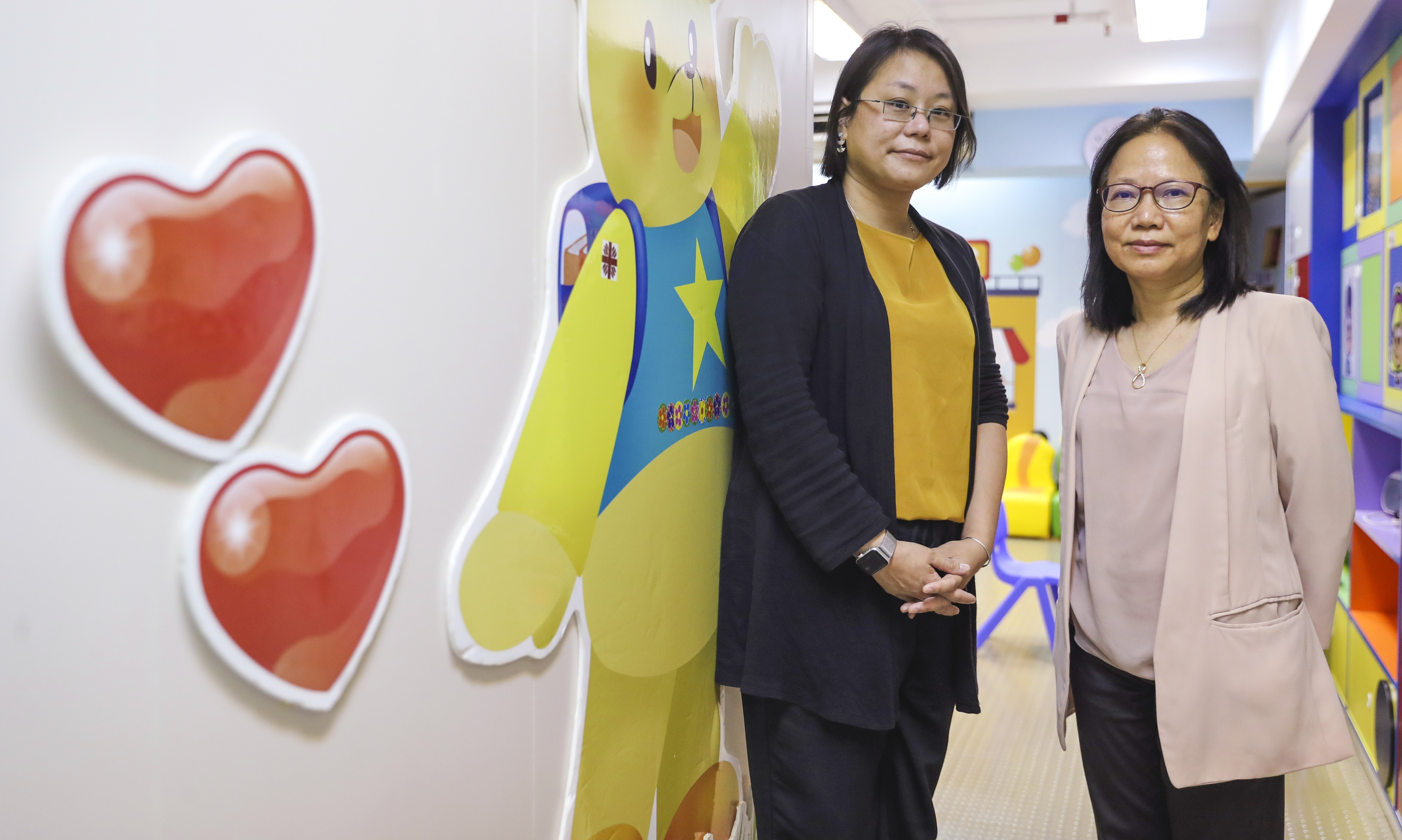 (L-R) Yip Shing-wai and Eliza Lee, social work supervisors at Caritas Lok Mui Early Education And Training Centre in North Point. Photo: Edmond So
