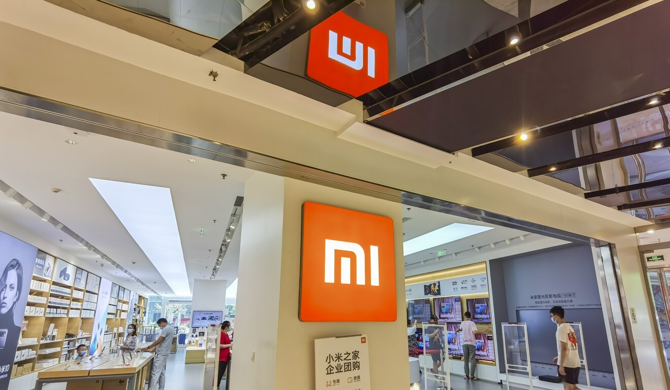 People visit a Xiaomi store in Shanghai in August. Photo: VCG/Getty Images