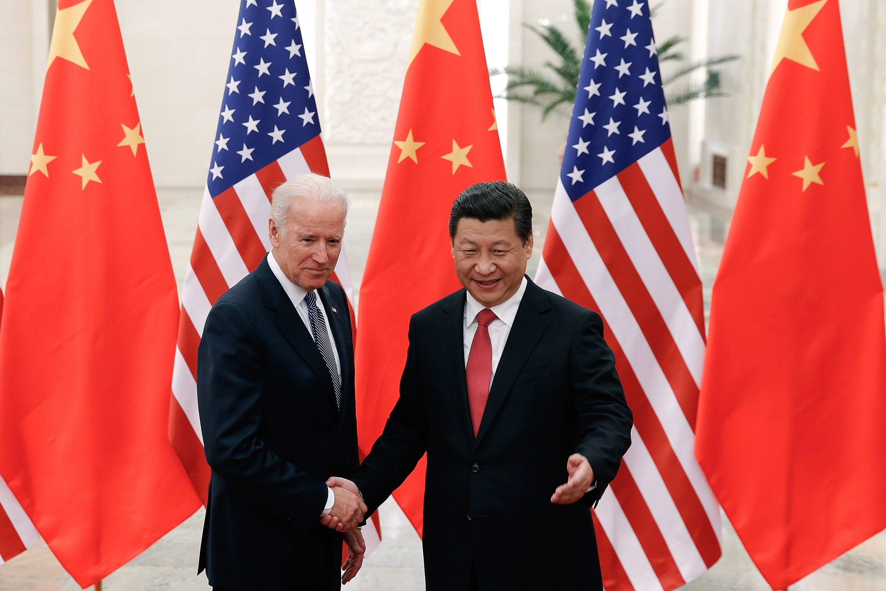 Joe Biden met Xi Jinping in Beijing in December 2013. Photo: TNS