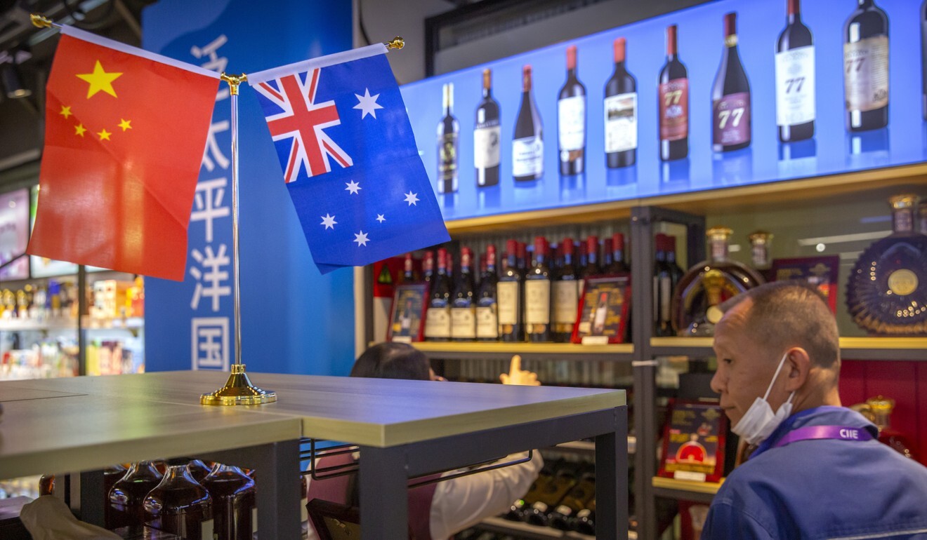 Australian wines on display at the China International Import Expo in Shanghai in November. China raised import taxes on Australian wine by 212 per cent, stepping up pressure on Australia over disputes including its support for an investigation into the origin of the coronavirus. Photo: AP